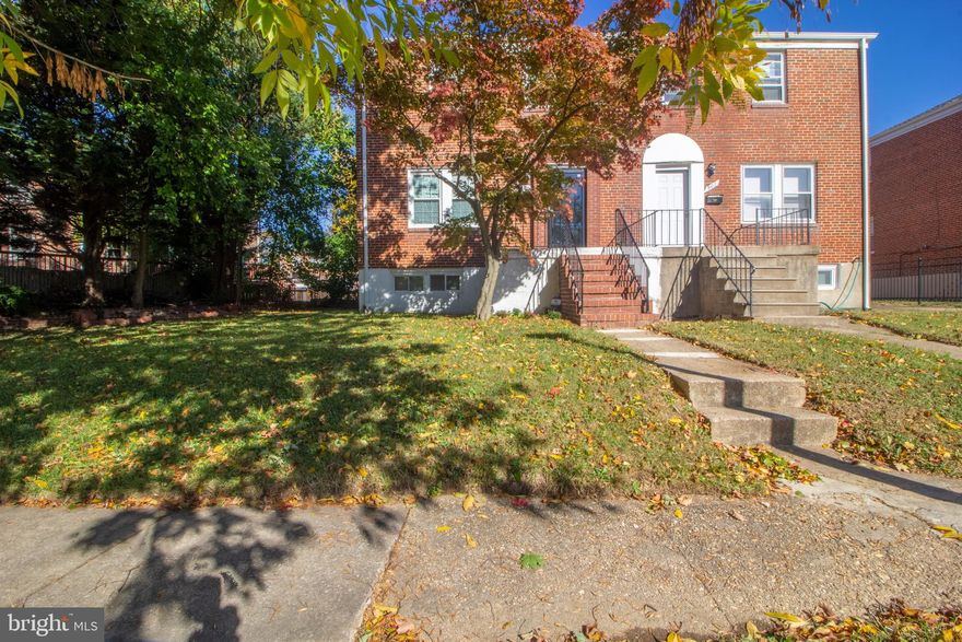 Welcome home to this 4 bedroom 2.5 bath home in in the Cedarcroft area. Walk into a light and bright living room with recessed lighting and wood floors flowing throughout the main and upper levels. Easily flow into the spacious eat in  kitchen. Kitchen features plenty of counter space, cabinet space and stainless steel appliances including gas stove and double door refrigerator with ice maker. A center island with breakfast bar is the perfect place to start each morning. Retreat to the primary bedroom upstairs with wood floors and two windows. Two bedrooms and a hall bath with tub shower completes the level. The basement is perfect for additional living space or rec room and includes the 4th bedroom and 2nd full bath, perfect for guests. Easily entertain in the warmer months in the large back yard with parking spot. Updates include A/C ('20) and Washer/dryer ('20). Enjoy easy access to 83, 695, shopping and dining. You do not want to miss this one!