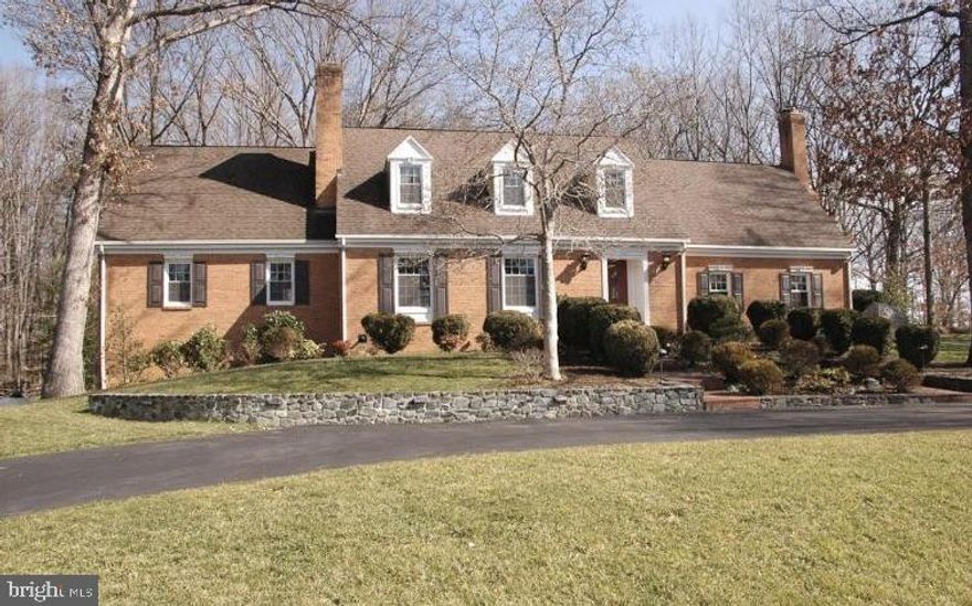 ASSUMABLE $600K VA loan at 2.25%
Escape from the hustle and bustle to your own stunning custom estate! Retreat to your private home on on a 1.6-acre wooded lot with views of nature. Enjoy down time by the fireplace in your primary suite or family room. Feel like you're living in a timeless bed and breakfast with hardwood floors, four fireplaces, and a chef inspired kitchen.  Entertain guests with your remodeled kitchen offering generous workspace and seamless flow to the living areas and formal dining room complete with granite countertops and high-end stainless steel appliances. Stately entrance welcomes you with a circular driveway and timeless curb appeal. Inside, beautiful hardwood floors, elegant built-ins, and four fireplaces create warmth and character throughout. 
The large primary suite provides comfort and warmth, while a separate, main level,  in-law or long-term guest suite offers privacy and flexibility for multigenerational living. The fully finished basement expands the living space with a pool table area, full bath, and additional room for recreation or relaxation.
Step outside to enjoy the serene, wooded setting complete with a hot tub—your own private retreat. This rare property combines luxury, space, and privacy, all just minutes from major commuter routes, shopping, and dining. Nearby you'll find Neabsco Regional Park, Potomac Mills Mall, and access to I -95.

NEWER 6 burner gas range!  HVAC replaced in 2025! NEWER water heater! ROOF replaced in 2024!