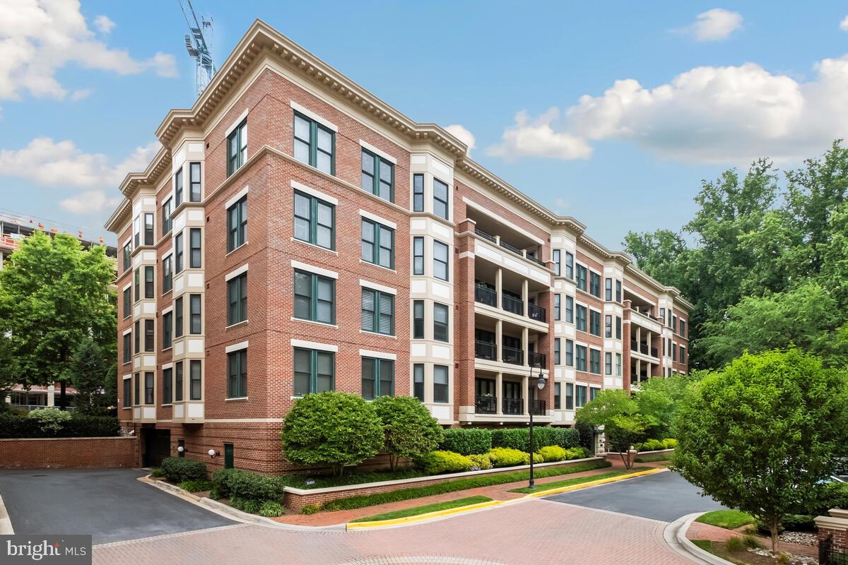Welcome to 10404 Strathmore Park Ct, Unit #405, a luxurious Penthouse three-bedroom PLUS den with two full bathrooms and a half bath, located in the highly-sought after Strathmore Park at Grosvenor neighborhood in North Bethesda, Maryland. This condo offers a modern and stylish living space with a host of desirable features and amenities, designed for comfort and convenience.
Enter and feel yourself drawn into this home’s bright and airy enchantment with substantial living and dining spaces enhanced by abundant, streaming natural light.
The Kitchen is a chef’s dream, equipped with built-in appliances, abundant cabinetry, and a center island, all of which combine functionality and elegance for all your culinary endeavors. The kitchen offers a breakfast nook in addition to the adjoining formal dining area for larger gatherings.
A resplendent living room accented by crown molding features wall-to-wall built ins and a cozy fireplace for everyone’s enjoyment. Both the living room and dining room provide multiple access points to the expansive balcony for outdoor dining and relaxation.
A den serves wonderfully as an additional living space or ideally as an office for hybrid or work-from-home professionals.
Boasting a dressing room, dual walk-in closets, and a bay window sitting area, the sumptuous primary suite includes a luxurious bathroom with a double vanity with built-in shelving, a make-up vanity, separate commode room, and a large shower stall with floor to ceiling tile, a bench, and grab bar modifications, ensuring functional safety for all ages.
On the other side of the home, two more generous bedrooms are served by another well-appointed full bath, providing guest and family accommodations.
With so much to love, this condo also includes in-unit laundry for your convenience, and two assigned parking spaces #405A and #405B (Handicap).
Ideally situated near all that North Bethesda has to offer, including the Strathmore Music Center, convenience abounds with nearby parks, trails, shopping, dining, and entertainment options. Just minutes away, you’ll find a variety of shops, boutiques, and restaurants catering to every taste and preference. Explore Pike & Rose, Westfield Montgomery Mall, Federal Plaza, Congressional Plaza, Rockville Town Center, Downtown Bethesda, and more.
Additionally, the convenience of this location extends to local commuter routes MD-355, I-270, and I-495, ensuring easy access to major highways, making daily commuting a breeze.
Don’t miss this fantastic and rare opportunity!