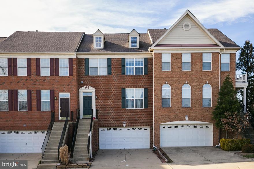 Former MODEL 2 CAR GARAGE, 3 Bed, 2.5 Ba BRICK TH with many extras! High Ceilings,Hardwood, Gorgeous MSTR BR/BA * NEWer HVAC&Water Heater,* REC Room with walk out to HUGE FENCED back yard * Built in Storage cabinets in Garage* Built in Home theater and TV convey*Custom DECK & PATIO *Dont let this opportunity go. Just make an offer