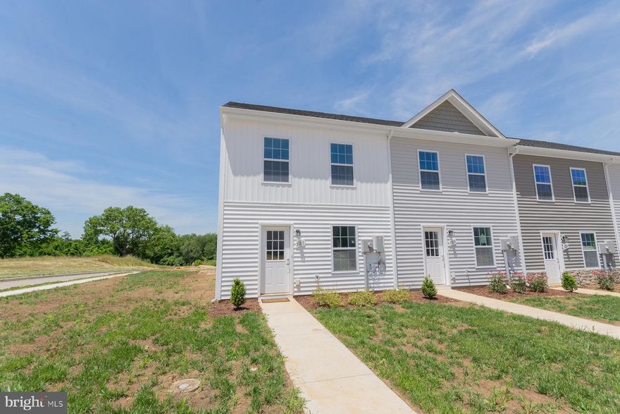 Immediate Delivery! One of our last end units available! We are offering 3% in closing costs!  Welcome to this beautiful townhouse with 1,296 sq ft of living space, perfect for families. The ground floor has a bedroom and full bathroom, ideal for guests, a play area, or a home office. The living space is filled with natural light, creating a warm ambiance. The kitchen, with modern appliances and ample storage, overlooks the living area.  Upstairs, there are two bedrooms, each with an ensuite bathroom. The primary suite features a spacious layout, a well-appointed bathroom, and a walk-in closet. Enjoy the large side yard to utilize for fencing, hangout area or play area!