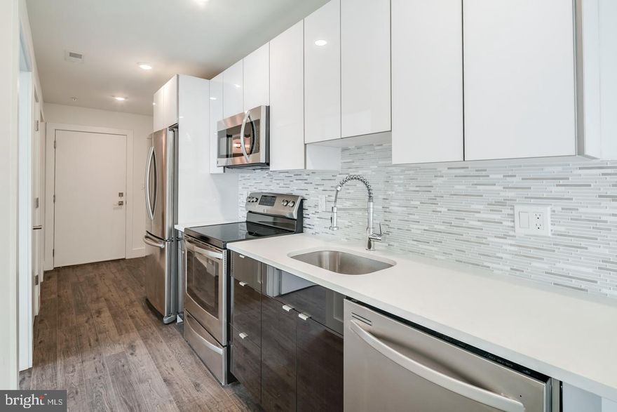 *Available 6/1*

Don't miss this luxury apartment building at the corner of 15th and Federal, just one block from the Broad Street subway station in Point Breeze and just minutes from Graduate Hospital and East Passyunk! The building includes a shared rear yard and high end finishes throughout! This gorgeous interior features amenities such as central air, designer lighting, washer/dryer in unit, and hardwood floors. A super modern gourmet kitchen is furnished with a garbage disposal, stainless-steel appliances that include a dishwasher, refrigerator and microwave, in addition to granite counter-tops and elegant designer cabinetry. The spacious bedroom is bright with a large south facing window for all day sunlight and includes a closet! The beautiful full bathroom has a modern vanity sink with cabinet doors and drawers, and bathtub/shower combination.

Lease Terms: Generally, 1st month, and 1 month security deposit due at, or prior to, lease signing. Other terms may be required by Landlord such as last month's rent upfront. $65 application fee per applicant. Tenants are responsible for: electricity, gas (if applicable), cable/internet and $10/mo technology fee. Water is a flat monthly fee of $60. Additional fees or requirements may be applicable for units with Homeowners or Condo Associations. Landlord Requirements: Applicants to make 3x the monthly rent in verifiable gross income, credit history to be considered, no evictions within the past 5 years, and must have a verifiable rental history with on-time rental payments. Exceptions to this criteria may exist under the law and will be considered. Cosigners will be considered.

*Small Dogs Permitted; 2 pets max, $500 pet fee required.
*Building is set up for Verizon ONLY