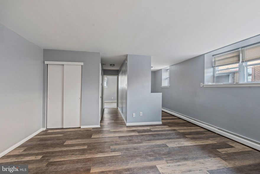 This lower lever 1-bedroom 1-bathroom unit blends updated finishes with original character. Enjoy  modern gray vinyl flooring, and fresh paint throughout, offering a sleek, move-in ready feel. The bathroom retains its vintage charm with classic green tile and a brand new bathtub for your comfort. Shared coin-operated laundry on-site. Located in a peaceful building on Rhawn Street, Unit 4A offers easy access to local conveniences and public transportation—just in time for summer living! First month’s rent, last month’s rent, and security deposit due at lease signing. 

Mandatory Requirements: Rent: $1,100/month + Electric, 600 or higher Credit Score, Proof of 3x Rental income and Rental history verification required. No co-signers. NO EVICTIONS .