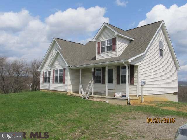 3 bedroom, 2 bath Cape Cod style home on 1.9 acres. Open living area on first level with laminate flooring and plenty of natural light. Beautiful view from back yard. Full unfinished walkout basement. Needs new paint and new carpet.
