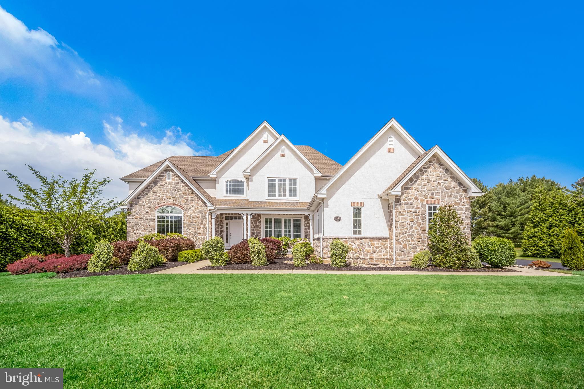 Rare opportunity to purchase a luxurious 4-bedroom, 3-bathroom, and 1-half-bathroom home located in the one-of-a-kind, ultra-desirable, gated Poet’s Walk community. This Whitman model house is a stunning example of modern architecture and design. It offers the perfect blend of elegance, comfort, and style, making it a dream home for any family looking for the ultimate living experience. As you enter this well-maintained and meticulously kept home, you immediately notice the attention to detail and impeccable design. You are greeted by a spacious foyer with a two-story ceiling, a modern crystal chandelier, and gleaming hardwood floors throughout the entire house. To the right, you'll find a formal dining room with ample space for large gatherings and entertaining. To the left is a private study featuring double French glass doors and a 12-foot cathedral ceiling. It provides the perfect space for a home office or reading room.
The two-story living area of the house is open and bright, with plenty of natural light streaming in through the large windows and double sliding glass doors with magnificent views of the private golf course. The living room features a fireplace, perfect for cozy nights at home, crown moldings, and opens up to a gourmet kitchen that boasts stainless steel appliances, custom cabinetry, and elegant granite countertops. The kitchen also features a morning room with an oversized window, a deck entrance, and a large island, perfect for cooking and entertaining. The main floor also includes the spacious master suite with a gorgeous tray ceiling, panoramic view window, another (third) entrance to a deck, 2 walk-in closets, a spa-like bathroom with soaking whirlpool tub, his and her vanity, a separate steam room with a bench, and a rainfall shower head and handheld sprayer.
Upstairs, discover the specious Princess Suite with an en-suite bathroom and windows facing the front, side, and back of the house. It provides ultimate comfort and privacy, making it ideal for guests, teenagers, or as a home office or workout space. This suite offers the perfect escape from everyday life. Across from the princess suite, there are two more king-size bedrooms, each with a walk-in closet, separate vanity rooms, and a Jack-and-Jill bathroom. These bedrooms are best for children who want to have their own space but still be close to each other.
This immaculately maintained luxury home features two-zone HVAC for year-round comfort and a whole-house self-maintained water filtration system. The unfinished full basement includes an egress window and 8-foot ceilings. The three-car garage and driveway have plenty of parking.
Poet's Walk HOA fees include front-lawn and backyard maintenance and snow removal from the driveway and walkway to the front door. Poet’s Walk community is neighboring the Spring Mill Country Club on the north and Warminster Community Park on the south. Community Park offers a skate park, a dog park, basketball courts, soccer fields, walking and biking trails, and more. House located in the award-winning Council Rock school district and just minutes from shopping, dining, and easy access to local highways, the PA Turnpike, and about an hour's ride by car or local train to Center City Philadelphia.
(P.S. All of the house's furniture, art, and accessories, with a few exceptions, are available for sale.)