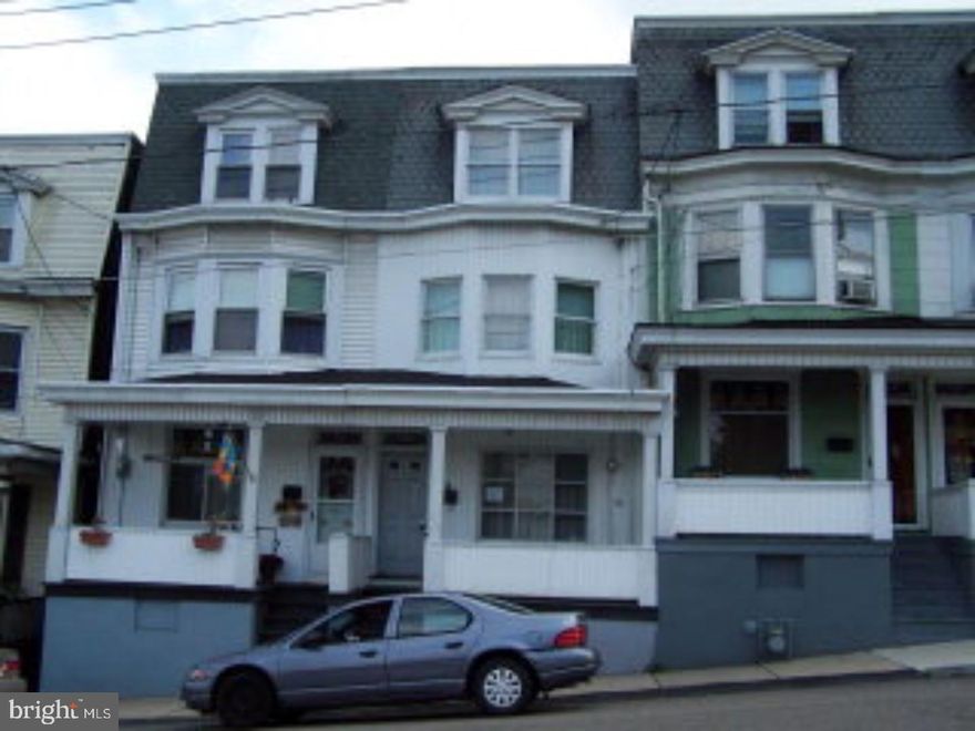 Nice colonial style row.  Needs some interior cosmetic work and refinishing.  Small back yard needs a trim.  Electric upgrades needed. Mailing Address Continued: Boulevard