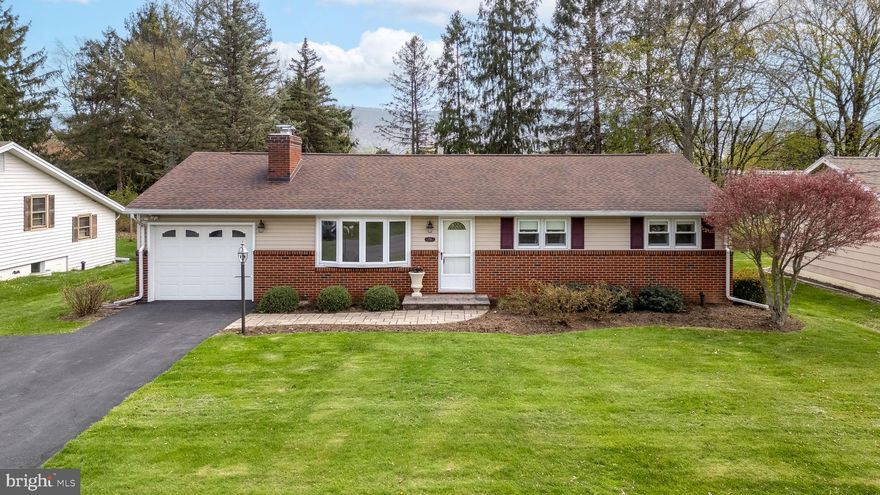 Darling 3 bedroom 2.5 bath vintage ranch on "The Hill" in Boalsburg.. Located in an Ideal setting nestled between Nittany View Park and open space behind St. Joe's School. This squeaky-clean ranch has been meticulously cared for over the years. While away the hours by the fireplace in the family room addition or relax in  the large rec room in the lower level.
Timeless hardwood floors adorn the living room, hall and bedrooms. Central air, furnace, roof, chimneys and bath remodeling round out the more recent enhancements. Private backyard features a 16x10 covered porch, adjacent patio, garden and storage shed. The oversize garage provides additional storage and workshop space. Location, condition and a touch of yesterday's charm make this a must see property.