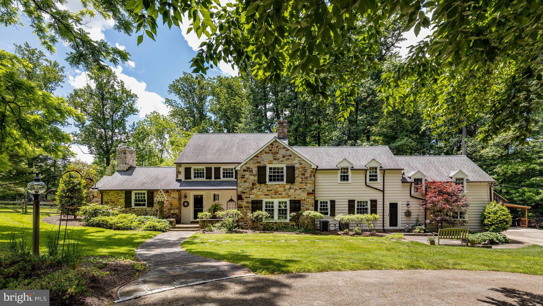 Welcome to 550 Morris Road located in Blue Bell, Whitpain Township.
This lovely stone and clapboard home offers 5 Bedrooms, 3.5 Baths, and over 3,580 on 1.75 acres with a pool and jacuzzi, pool house, two connecting flagstone patios off the back of the house, a "she shed" and beautiful new garage covered with reclaimed antique barn wood with heated floor.
Built in 1945 as a wedding gift to the previous owners, this house has been lovingly maintained and updated by the current owners who purchased the property in 1993. Features include: a Rene Hoffman designed kitchen and addition with Blue Bell Kitchen cabinets, all new Marvin windows on first floor, Owen Corning 30 year shingles on entire roof and new gutters and gutter guards (2021), central AC, upgraded electrical service, 1st floor bathroom redo, house painted (2020), rebuilt chimney (2020).
550 Morris Road backs up to 57 acres of the Armentrout Preserve's natural, unpaved trails shared by walkers and equestrians and is in the Wissahickon School District. Move right on in to this wonderful house nestled into acres and acres of preserved land with easy access to Ambler, Plymouth Meeting, the PA turnpike, the Blue Route , Chestnut Hill and More!