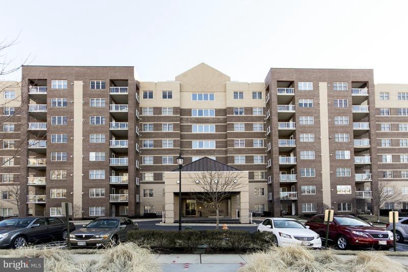 IMMACULATE 7TH FLOOR CONDO IN MAYS CHAPEL NORTH. 1700 SQUARE FEET. 2 BEDROOMS AND A DEN, 2 FULL BATHS, FAMILY ROOM, WOOD FLOORS, BALCONY, UPGRADES, ETC. WALK TO SHOPPING CENTER. MINUTES TO MAJOR ROUTES.