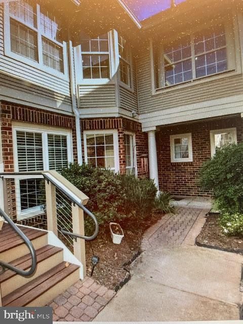 Photo of 45070 Brae Terrace #102, ASHBURN, VA 20147 (MLS # VALO2118328)