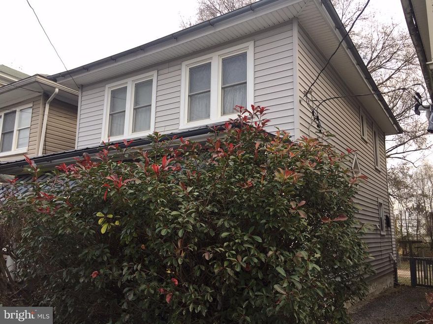 NEW PRICE!  Furniture is optional. HAP (Homeowner's Assistance Program) Eligible with Grants up to $14,500 while funds available.  Affordable detached house w/covered front porch, entrance foyer, living room, dining room, kitchen, sun room, deck, 2 large bedrooms, 1 small bedroom with attic access (attic is unfinished w/high ceiling) and den/walk-in closet, awaits your finishing touches.  Wood floors, fenced back yard, gas forced air heat, central A/C & 3-car parking pad off alley.  $58k mortgage at 3.25% might be assumed w/lender approval ($587.67 current principal, interest, taxes & insurance payment).   Information & Disclosures online in Documents.