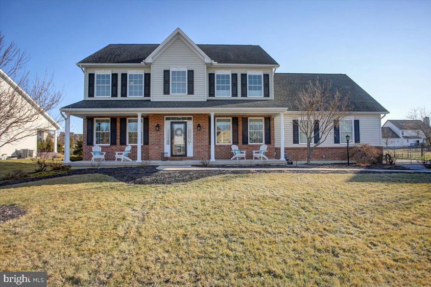 Welcome to this lovely 2-story traditional style home built by Tiday/Claypool builders. This home combines classic design with modern amenities, providing comfort and convenience.
As you enter, you'll find a formal dining room, great for family dinners or gatherings. Across the way is a versatile room with French doors that can be used as an office, living room, or playroom, tailored to your needs. The rear portion of the house features an open layout full of natural light. Built-in shelves and columns separate the family room from the spacious, fully equipped kitchen. The kitchen includes an island with countertop-height seating, perfect for casual meals. There’s a small mudroom when you enter from the clean 3-car side entry garage. The garage offers extra storage, a workbench, and a second refrigerator/freezer combo, making it practical for everyday use. The upper level has a primary suite with hardwood floors, built-in shelves, a cozy sitting area, two walk-in closets, and a large bathroom with a soaking tub, separate shower, water closet, and storage.
There are three additional spacious bedrooms with large closets, a walk-in laundry room, and a bathroom with separate double sinks and a shower/tub area, perfect for a busy family.
Outside, enjoy the covered front porch for your morning coffee. The newer low-level deck leads to a patio with built-in  firepit, ideal for outdoor gatherings. There is a gas line from the house that connects directly to the Weber grille. This home offers a great blend of traditional charm and modern conveniences located in the community of Meadowbrook Farms.