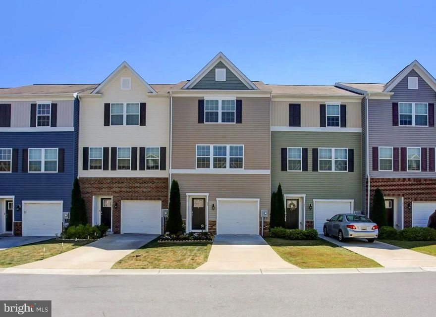 SEE VIDEO TOUR!!!  Located in Berkeley Ridge, just minutes from I-81, shopping and dining, you’ll find this 3 bedroom, 2-1/2 bath, 6-year-old townhouse.  Entering the front door, you’ll be greeted by the foyer with stairs to the upper level and a hallway to the rear bonus room/office.  You will also find a half bath and sliding door to the back yard area.  Ascending the stairs to the main level is the open concept kitchen/living room area with vinyl plank flooring throughout.  The kitchen features a large island with double bowl stainless sink, granite countertops, ample cabinetry, pantry closet, nook area, matching stainless appliances and a sliding door to the rear deck.  The living room offers plenty of space for any combination or layout of furniture.  Heading to the upper level is the primary bedroom with walk-in closet and attached en-suite full bath featuring a tile shower and double bowl vanity.  Down the hall is the laundry closet, another full bath and two additional bedrooms.  If you have been looking for a townhouse and are tired of seeing ones in sub-par condition, you won’t want to miss this one as it is in great condition.  Combine all of this with a great location, roof, appliances and HVAC only 6 years old, and a garage as well and you may have just found the property for which you’ve been looking!  6 hour advance notice for showings.