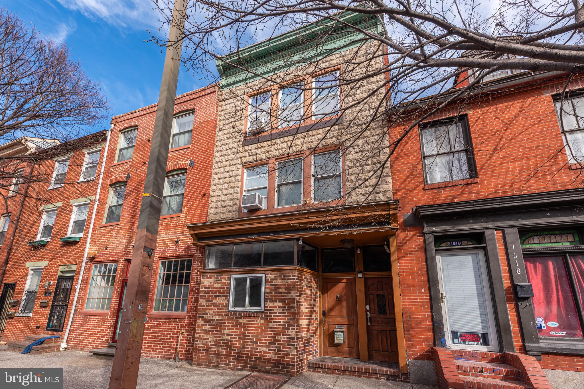 Ideal Investment Opportunity in Fell's Point! Discover an exceptional chance to own a mixed-use property in the bustling heart of Baltimore. Zoned C-1, this versatile property allows for the addition of more apartments above the existing garage or the subdivision of the current structure into multiple units. Perfect for investors and homeowners alike, it features legal zoning and separate metering. The first-floor unit offers a cozy one-bedroom, one-bathroom layout with high ceilings and hardwood floors, creating a welcoming atmosphere. The expansive two-level apartment on the second floor includes a spacious eat-in kitchen, a large living area, three bedrooms, and two full bathrooms. A rare gem in Fell's Point, this property comes with a three-car garage, providing valuable parking space. Enjoy city views from the two-tiered rooftop deck, perfect for relaxing or entertaining. Just steps from the newly renovated Broadway Market and Atlas Group's Choptank restaurant, and two blocks from the Fell's Point waterfront, Sagamore Hotel, and Thames Street. With a proven track record as both a long-term rental and Airbnb, this property offers lucrative returns. Don't miss this chance – invest in Baltimore's thriving real estate market today!