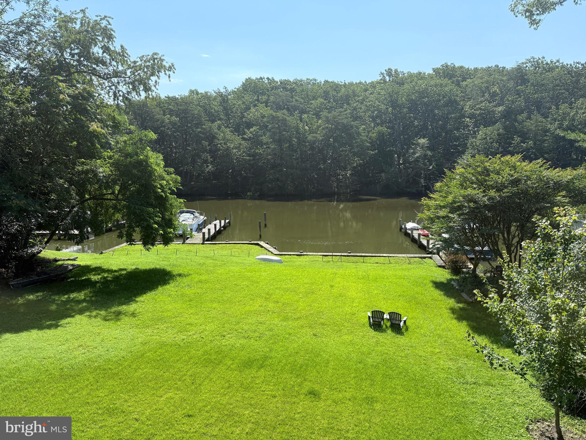 Professional photos coming soon. Welcome to waterfront living at its finest. This stunning 5-bedroom, 3.5-bath custom home, built in 2018, offers expansive views of Spa Creek from every level. Perched on a generous 0.41-acre lot with a private deep-water boat slip (5’ MLW), this home is a rare rental opportunity in Annapolis.
Inside, you'll find an open floor plan designed to take full advantage of the water views, featuring a gourmet kitchen with a dramatic waterfall island, high-end appliances, and walls of windows that fill the space with natural light. The main living level flows seamlessly from the kitchen to the dining and family rooms, perfect for both entertaining and everyday living.
An elevator serves all three levels, including the light-filled walkout lower level that features floor-to-ceiling windows, a large recreation area, a bedroom, and full bath—ideal for use as an in-law or guest suite.
For even more flexibility, a private 1-bedroom, 1-bath guest suite with its own entrance, family room, and kitchenette is available for an additional $1,200/month—perfect for multigenerational living or an au pair.
Enjoy the serenity of Spa Creek from your backyard, launch your boat from your private slip, or simply take in the views from the comfort of your home. This is a rare rental offering that blends luxury, convenience, and waterfront charm.
