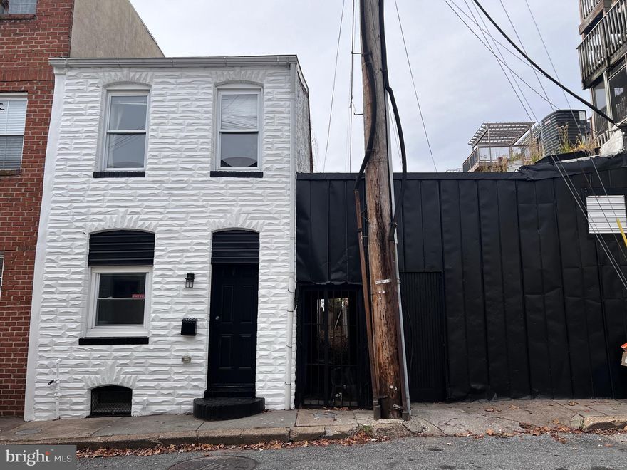 This 2-bed, 2-bath brick row home features an open floor plan, spacious living area, and a newly renovated kitchen with modern finishes. Enjoy new flooring throughout and fresh exterior paint with sleek black window seals for standout curb appeal. Just one block from Patterson Park, offering 137 acres of green space and amenities like tennis courts, a dog park, playgrounds, and more.

Located on a quiet street with walkable access to Canton Square, Fells Point, Johns Hopkins, Bayview, and Downtown. One of the most affordable updated homes in one of Baltimore’s most desirable neighborhoods—don’t miss it!