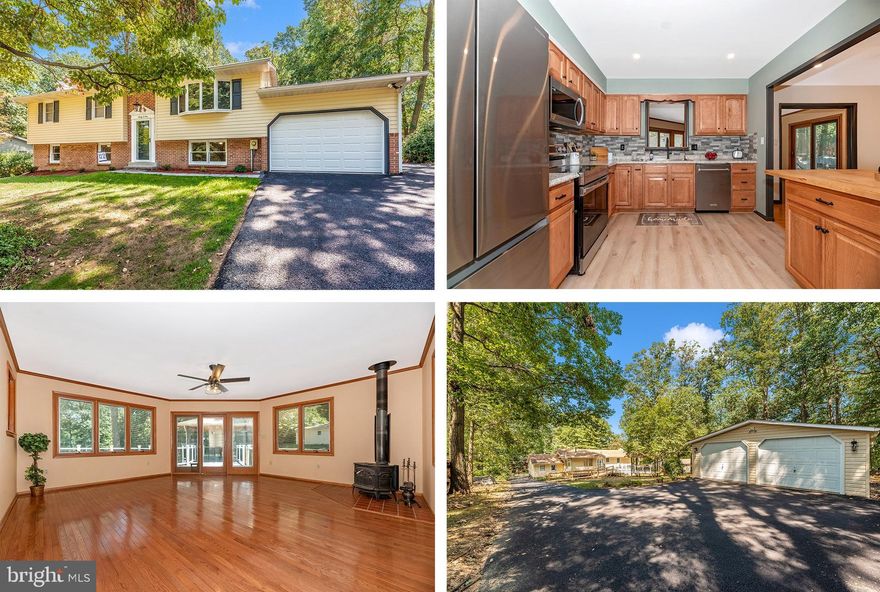 Not Your Average Split Foyer!  Beautifully Renovated & Updated  Super Spacious Home has so much to offer: New Tasteful Carpet, Paint, Ceramic & Luxury Vinyl Plank Flooring, Stainless Steel Appliances, Countertops, Backsplash,  Bathroom Toilets & Vanities; Front and Rear Paver Walkways; Ceiling Fans and Attractive Overhead Lights,  Huge Awesome New Trex Deck with Portico to Entertain on those Warm Summer and Fall Evenings; Asphalt Driveway Paved & Extended to the Oversized 33' x 24' Garage with Electric; New Radon Remediation System, Attached Garage w/Transfer Switch for Portable Gas Generator (that Conveys) plus So Many More Updates! The Home also boasts a Large Living Room w/Bay Window; Formal Dining Room off Kitchen with Peninsula and Room for Seating;  Gleaming Hardwood Floors; Huge Sunroom w/Woodstove, Tons of Windows with Built-in Blinds and Slider to the Rear Deck & Yard plus an Additional Slider to the Driveway/Attached Garage Access; 3 Main Level Bedrooms & 2 Full Updated Baths;  On the Lower Level, You'll Find a Family Room w/Brick Hearth & Woodstove; Updated Half Bath; 4th Bedroom,  Cedar Closet & Utility/Laundry Room &  Rear Door to the Back Yard;  New Grass will be Growing Soon, as the Front Yard has been Seeded, and Top Soil brought into Rear Yard and Seeded;  You'll Love all the Lovely Indoor and Outdoor Living Spaces, and all the Tasteful Updates and the Super Carroll County Location!  All this, Plus One-Year Cinch Home Warranty.