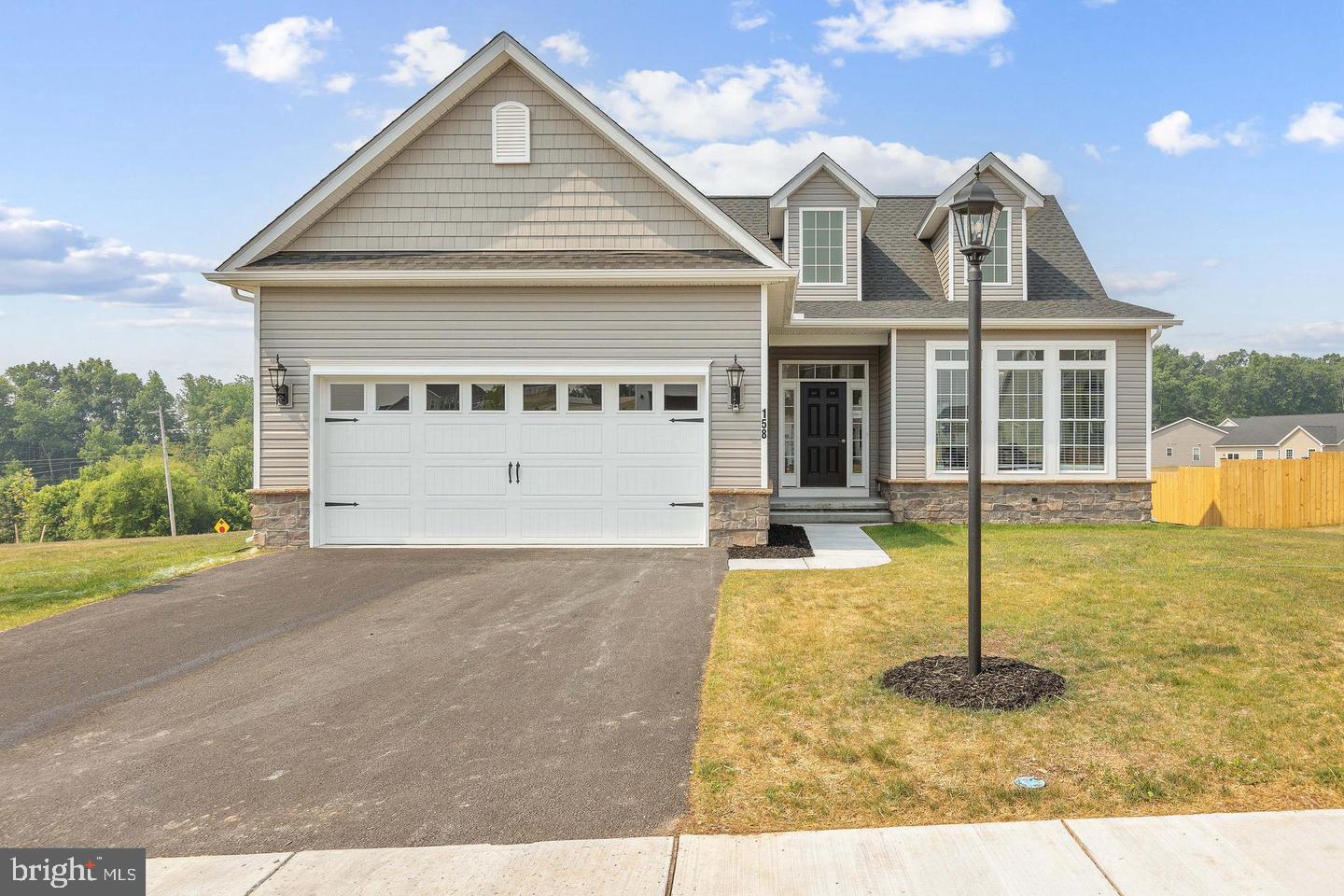 Welcome to Thornbury Hunt II! $15,000 in Closing Assistance or Options! This Nicole Model. Photos may show additional options (SIMILAR PHOTOS) This Nicole rancher features 3 bedrooms, 2 full baths, 2 car garage with a full basement. . Step inside and you will find 9ft ceilings that is open from kitchen to the great room. LVP flooring throughout foyer, kitchen, hallways, and great room with gas fireplace making cleaning a breeze! Kitchen ,featuring 36" cabinets with crown molding and granite countertops, has a kitchen island perfect for cooking and gatherings and large pantry. Primary bedroom is very spacious and has a large walk-in closet plus a custom tiled bath with walk in shower and double sinks!
***Close proximity to Long Creek Reservoir, Codorus State Park, and Shopping. Commuter Friendly and just minutes for the MD line.*** Incentives may be available with use of Builder Preferred Lender and Title Company.