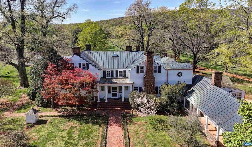 OLD KESWICK - With its breathtaking rolling fields of pastureland and views of the historic Southwest Mountains in the distance, Old Keswick is located in the heart of Albemarle County?s Keswick farm and estate country. The house began as a log hunting lodge in 1745. Thomas R. Blackburn, a Virginia architect who trained under Thomas Jefferson, constructed the circa 1832 story & half front of the house. The architectural integrity and beauty of this historic 8,000+/- residence remain intact. There is a full complement of farm dependencies. A unique and extremely private domain which is steeped in Virginia history.,Fireplace in Bedroom,Fireplace in Dining Room,Fireplace in Foyer,Fireplace in Living Room,Fireplace in Study/Library