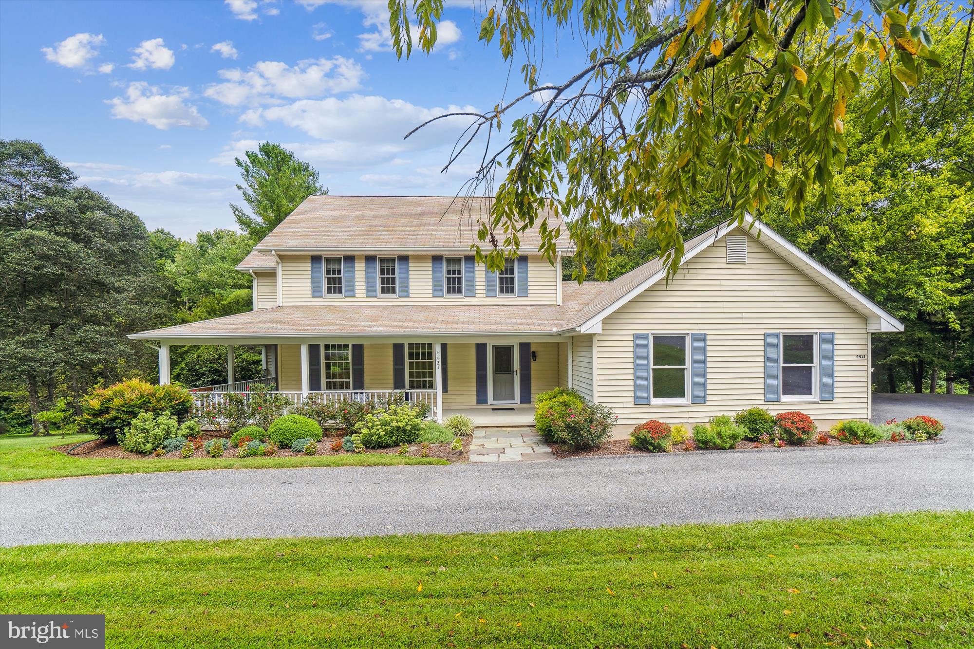 Open House Sunday 8/24/25 noon - 2 pm. Straight out of Country Living , 2 acre property in Harwood located just 5 miles south of Edgewater Set back off the road and backing to woods makes this property quiet and private. Perfect property featuring 2 exterior outbuildings ideal for working from home, hobbyist, yoga studio, machine shop, car collector, chickens, pets, and or boat storage. Country living at its best! The exterior is stunning...from the large wrap around porch, new rear deck with privacy shutters, circular driveway, rolling grassy hills, mature trees, perennial plantings and beautifully built workshops, this is not one to miss! Quality Amish built large pole barn. features tall ceilings and enough space for 10 cars! Plumbed for radiant heat, as well. The second outbuilding features a generous workshop and tractor storage. Seller has had the interior walls freshly painted along with an outdoor living space with a renovated a stylish deck adding a louvered plantation wall creating privacy from the neighboring property . The functional interior floor plan is equally appealing with a circular flow, large rooms, and many updates throughout. The main level has a large and inviting living room off of the entrance foyer; a formal dining room with access to the front porch and a large bay window; the open eat-in kitchen has been updated with brand new GE Cafe stainless appliance's and step down to the large cozy family room with built in serving bar and handsome wood-burning fireplace flanked by custom built in bookcases. The garage entrance flows to a large mud/laundry room and powder room. The main level laundry/mud room has pantry storage and newly installed washer and dryer. There are 4 bedrooms upstairs with a large primary suite with walk in closet and updated full bathroom; two large bedrooms and one smaller bedroom with stairway access to the large floored attic; and updated hall bathroom. The lower level is partially finished and freshly painted and a blank slate! The Gandy pool table will convey! Additionally, there is an lower level office and kitchenette with walk out to the backyard. There are so many options with this property as it is zoned RA (residential agriculture)....have a small hobby farm, expansive gardens, put in a pool, or just enjoy the open space and having fun in the workshops. Additional updates include a super new water treatment system, new well pump including state of the art water filtration and reverse osmosis . You do not want to miss this opportunity! No Hoa fees Harwood is conveniently located just South of Davidsonville and and is approximately 5 miles to nearby Edgewater shopping centers. Charming waterfront village of Galesville featuring waterside restaurants is a short drive as well. Easy access to Rt 4 for commuting into upper Marlboro, AAFB, Northern Va or Wash DC. Enjoy the pastoral views of Horse farms and rolling hillsides of Southern Anne Arundel county! Blue Ribbon Southern High School district