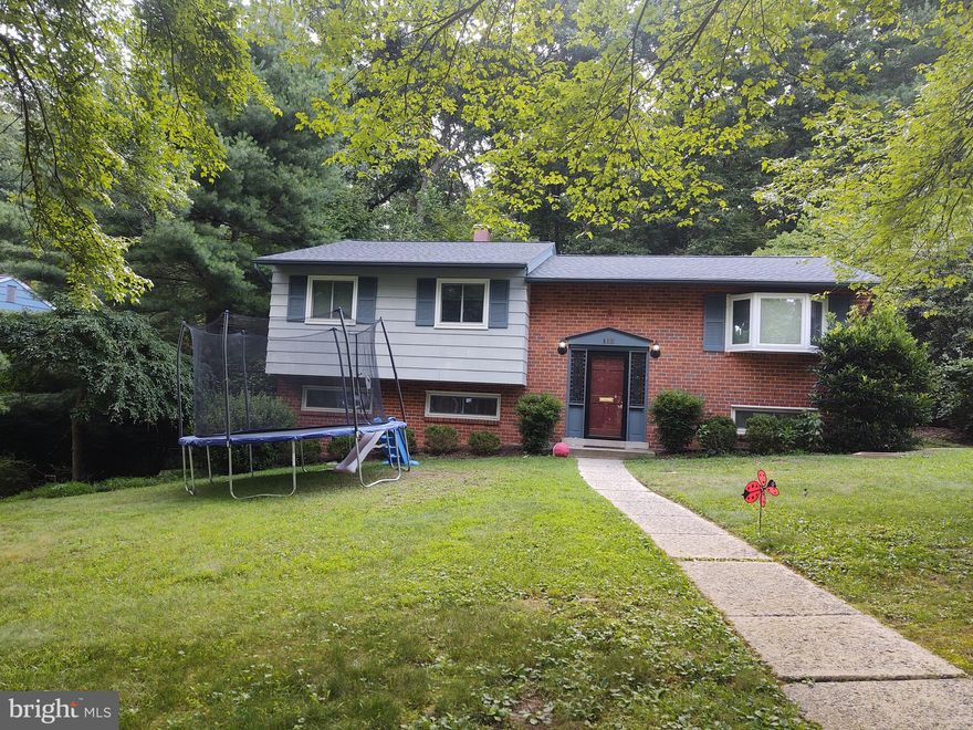 Well-kept 4 Bedrooms, Office/Guest Room,  2.5 Bath with Sunroom Addition, Wood Deck and Backyard Backing to Parkland. Primary Bedroom features a  Door to Deck; Spacious Kitchen with Wood Cabinets and Breakfast Room Area; Lower Level has Daylight Family Room, 4th Bedroom, Powder Room, Bonus Room, Workshop and Lots of Storage. Great Location - Close to  Northwest Branch Hiking Trail; Renovated Kemp Mill Park, Kemp Mill Shopping Center, Public Transportation, Swim Clubs, Houses of Worship, and Schools. Short Drive to New Wheaton Library, Westfield Shopping Center, Sligo Creek, and Wheaton Regional Parks