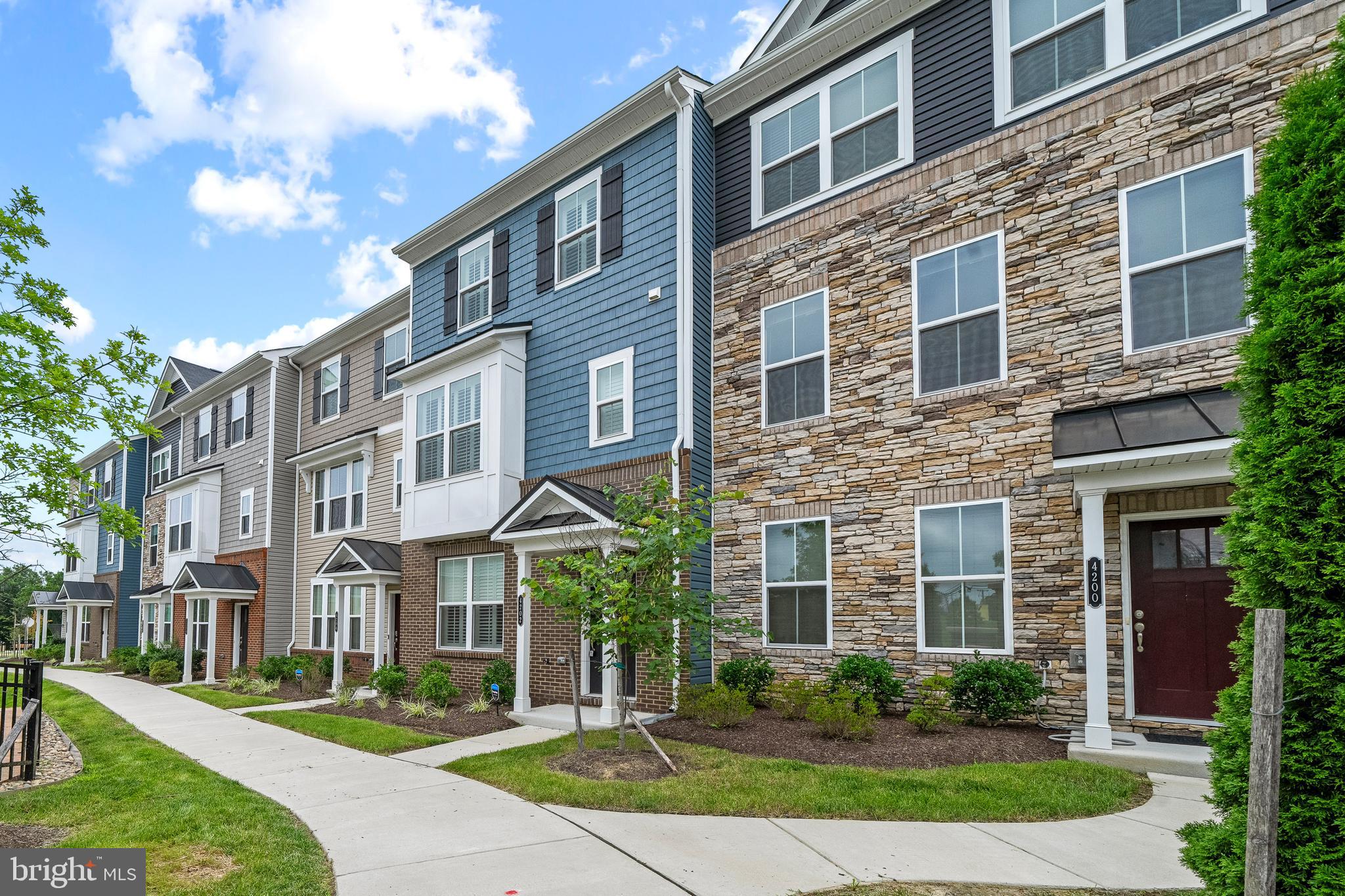 Welcome to this stunning, nearly new townhome located in the highly desirable Centennial High school district. This modern, move-in-ready home offers a perfect blend of comfort and style, featuring spacious living areas and thoughtful upgrades throughout.
The main level boasts an open-concept layout, including a bright living room, a stylish half bath, and a chef’s kitchen equipped with stainless steel appliances, a gas range, double oven, and a large island—ideal for cooking and entertaining. Step outside to a charming balcony, perfect for relaxing or hosting gatherings.
The finished basement adds versatile living space, featuring a bedroom or home office with an adjacent full bathroom—perfect for guests, a home office, or additional private retreat.
Upstairs, you'll find the primary suite with a luxurious full bathroom, including a dual vanity and a standing shower. Two additional bedrooms share a full guest bathroom, along with a conveniently located laundry closet with a stackable washer and dryer.
Additional features include a 2-car garage, energy-efficient systems, and designer finishes throughout. This home is part of a vibrant community offering amenities such as tennis and basketball courts, parks, and nearby conveniences.
