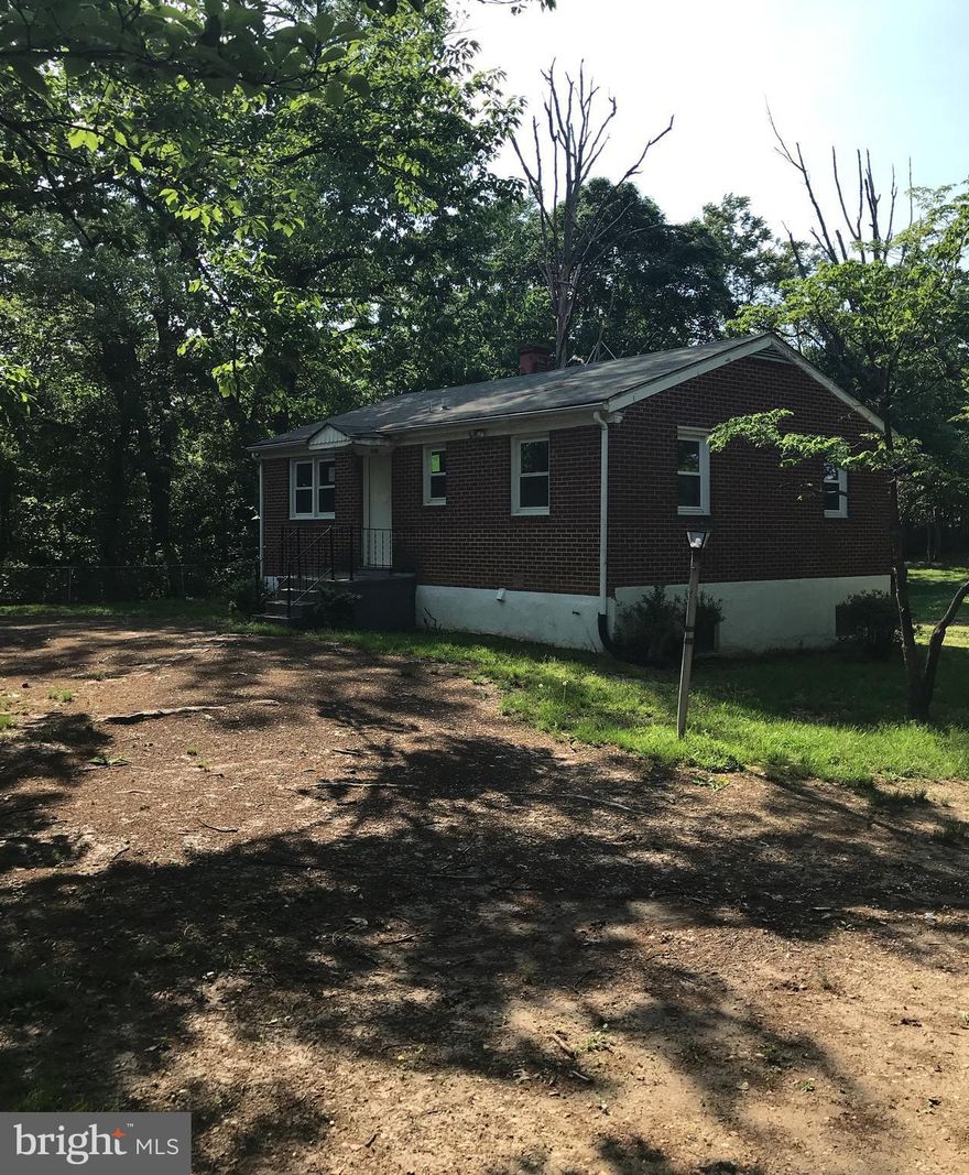 Rambler located at the end of the street on am oversized lot.  There is NO HOA so the location is ideal for work vehicles.