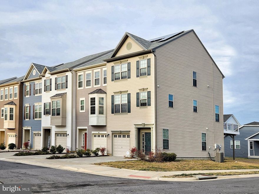 ** Beautiful End Unit Townhouse!  **  3 Bedrooms and 3.5 Baths.  **   Composite Large Deck. ** Light and Bright for 6 Windows on the side of the home. ** Two Large Master Suite with Luxury Baths on Upper Level. ** Large Bedroom with Full Bath in the Walkout Basement.  ** 
Kitchen has SS Appliances, Lots of Cabinets, Spacious Pantry and Breakfast Nook leading to Maintanace Free Large Deck.  **  Island in the Kitchen. ** New Washer & Dryer will be delivered.  ** High Ceiling!  ** 3 Ceiling Fans.**  9 New Faux Blinders just installed!  ** 1 Car Garage with 2 Driveway Parking.  ** Lots of Visitor Parking. **  New Community and Built in 2019.   ** Great Comminity with Pool, Play Ground, Walking Trail, and Pier/Dock.  **  5 Minutes to VRE Station and 10 Minutes to Downtown Fredericksburg. ** Warm and Lovely Home!  ** Please wear shoe covers provided for showing.