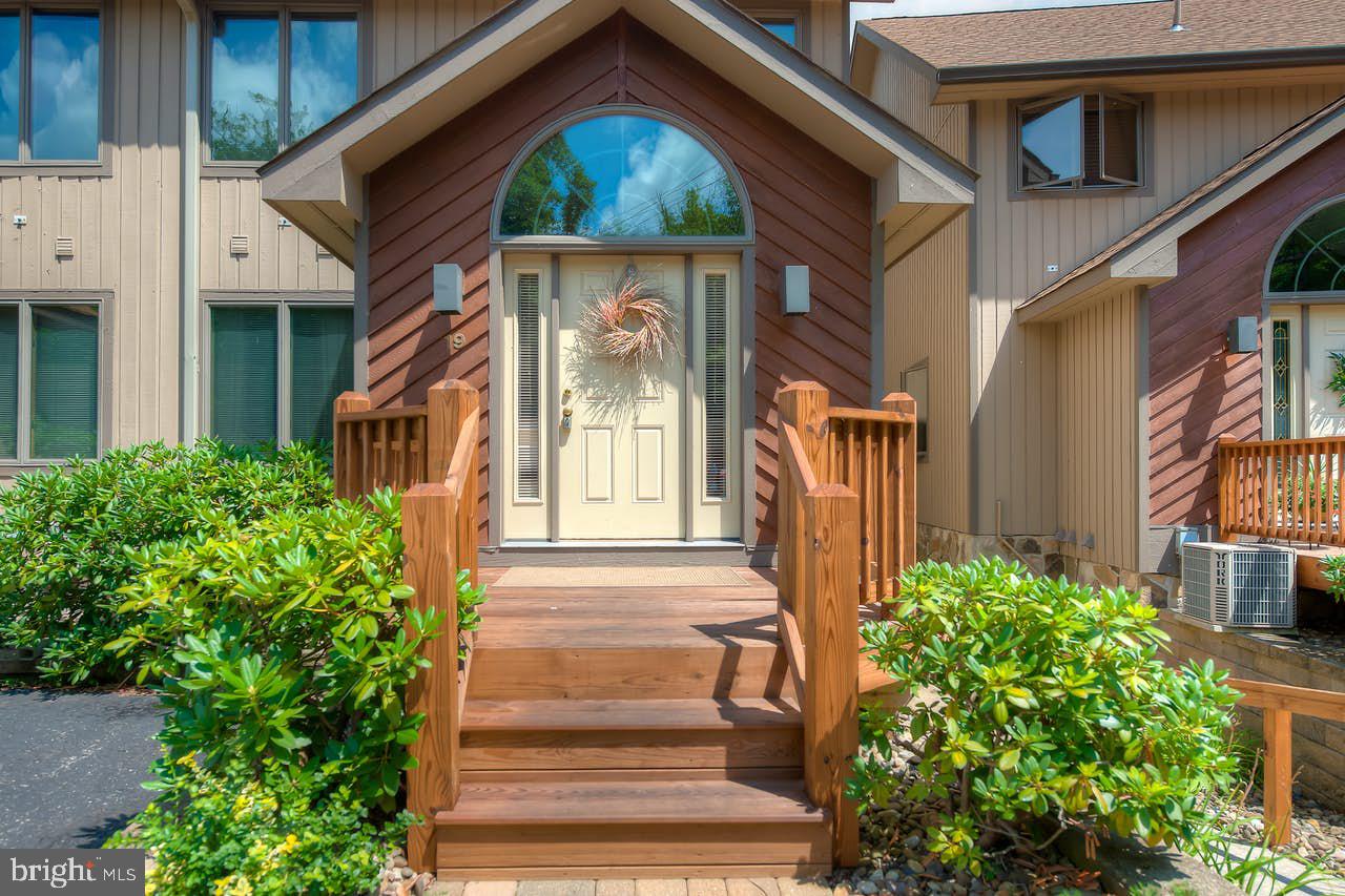 SEE DOCUMENTS FOR 07/2025 TAX STATEMENT--$1,533 annual assessment for HOA reserves. $1,500 Annual fee to Bill's Marine for assumable boat-strip lease. $4,500 Annual condo fees. Condo Association responsible for roof, building exterior maintenance, lawn maintenance, snow removal, replacement of deck, porch and front door. Water is included in the condo fees. Sewer fees are not included and average $90 quarterly--(owner is not a full-time resident). Community does not permit short-term rentals. Beautiful lakefront Glendale Shores EOG condo townhouse. Well maintained and furnished with three-bedrooms, loft and two bathrooms. Moosehead on great room wall is excluded/negotiable. CAC replaced 3-4 years prior. Updated appliances. Main-level bedroom and bathroom with jetted-tub. Pellet stove in great room. Finished area is estimated. Original owner.