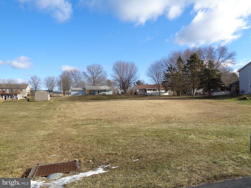Mostly level building lot  in Colonial Hills. Public water and sewer available. Granville Township sewer fee is $4,093 and MABL Water Tap fee is $920 with a basement and $1,420 with slab or crawlspace construction (meter pit required). Property tax is estimated based upon adjoining lots. Granville Twp setbacks are greater than deed restriction setbacks (Granville Twp side setbacks are 25', 10'minimum). Sewer and storm water easement on left side of lot. Buyer and buyer agent to independently verify info. Deed restrictions include no businesses, no animals other than household pets.