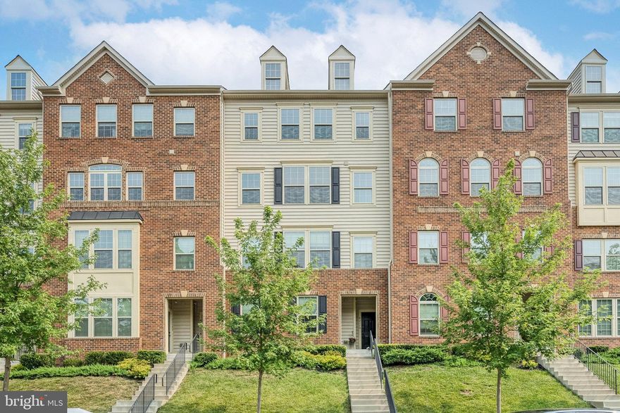 Stunning, luxury townhome style condo with 3 Bedrooms, 2.5 Bathrooms and over 2,600 SQFT in the highly sought after Virginia Manor Community! Open floor plan, high ceilings, tons of natural lighting on main level. Brilliant floor and wall space accommodates a variety of furniture placement options to fit any lifestyle. Walk up into the light filled formal Living Room with recessed lighting and beautiful crown molding. Continue walking into designer Kitchen anchored by a gigantic center island with sink and breakfast bar with additional seating. Tall ample cabinetry complements the granite countertops, beautiful backsplash, and stainless steel appliances. An open breakfast room and cozy Family Room with gourmet Kitchen in one open floor plan to create a space for all to gather.  Master Suite with tray ceiling, enjoys windowed sitting nook and TWO walk-in closets. En-suite luxury bath has two granite vanities, deep soaking tub and step-in shower with bench. Two secondary bedrooms share a Bath with double sink vanity and tub/shower.  Upstairs includes Laundry Room with built-in cabinets and front-load stacked washer/dryer duo. 1-car garage with storage space, automatic openers and driveway parking (plenty of visitor parking too!). Amazing community amenities: fitness center, pool, tot lots/ playground, walking/biking trails, tennis courts, and club house. Convenient to shopping, restaurants, Route 50, Gum Springs Road and easy access to the highways! This is a must see!