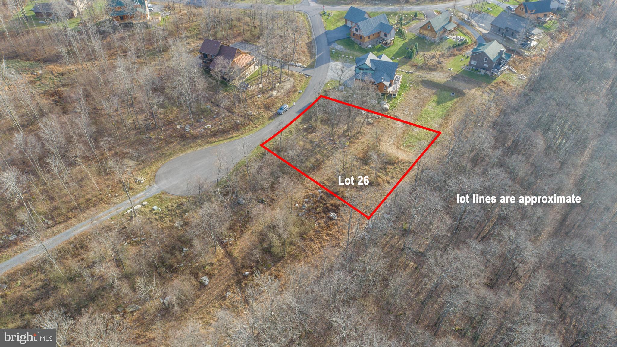 Lot 26 Rocky Gap Trail is located in the gated North Camp subdivision on the back side of Wisp Mountain. The expansive, level lot offers endless possibilities for development, from building your dream home to creating a garden or outdoor retreat. ASCI Whitewater Rafting and Wisp Resort ski access are both just minutes away. Enjoy the privacy of a gated mountaintop community while still remaining close to all Deep Creek Lake amenities. Whether you're looking to build a dream home or invest in a serene slice of nature, this property combines convenience with the beauty of the mountains. Please find two documents from an architect that shows the useable space on the lot as well as a basic house with garage layout.