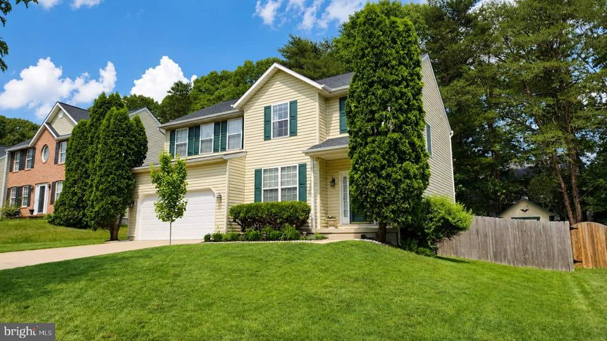 Welcome to this beautifully updated 4-bedroom home nestled in the established Jason’s Landing community, offering an incredible community pool and clubhouse with adjoining park and playground space. This wonderfully cared for home boasts HVAC replaced in 2023,  roof replaced  in 2020 with 50-year architectural shingles, and a new garage door and shutters in 2026. The first floor features light-filled 9-foot ceilings over a gleaming solid hardwood floor. The inviting layout allows for personal touches in curating spaces for living, dining and home office uses. The fully renovated kitchen is equipped with a gas range and stainless-steel appliances and is open to the family room accented by a gas fireplace. From the heart of the home, you are just a few steps to the attached deck, which looks over a spacious and private backyard paradise, featuring mature shade trees, winding pathways, low-maintenance perennials and ground cover, and a cozy firepit area perfect for relaxing or entertaining. A large finished shed with electrical service can function as a studio, toy storage or personal retreat, with easy street access through the double gate. The second floor offers 4 spacious bedrooms off a wide hallway. The primary suite includes a large ensuite bath with double vanity and corner spa tub, large walk-in closet with upgraded built-ins. The convenient upstairs laundry enhances the second story layout. Car enthusiasts & hobbyists will appreciate the spacious two-car garage with ample cabinetry and a high ceiling. And the moveable hydraulic car lift can be included with your offer! Enjoy weekends at nearby Severn-Danza Park,
featuring walking trails, sports fields and courts, and a BMX track. This home is conveniently located near MARC train service, Fort Meade, NSA, and BWI Airport, with easy access to Washington, D.C., Annapolis, and Baltimore. Highly-rated Anne Arundel County schools are a huge plus!