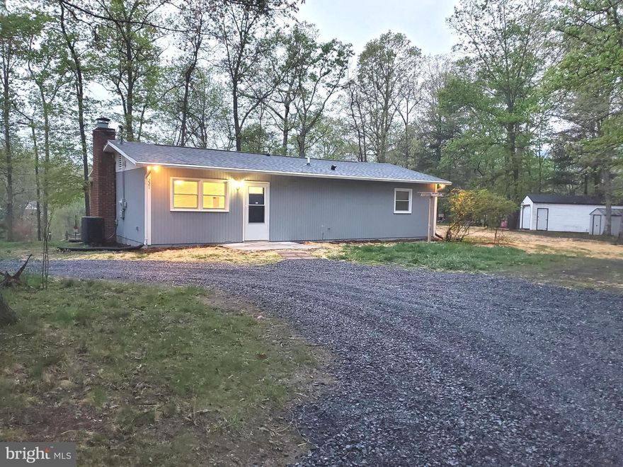 Great starter home located on corner lot in rural community.  3 Bedroom 1 Bathroom on 1 level with new windows, new roof, new carpet and flooring, light fixtures and more.  Plenty of parking with circular driveway.  LARGE workshop (approx. 36x15) and small storage shed.  New septic tank, D-box and lines, central AC/forced heat (baseboard heaters also installed),  fresh mulch and gravel! This HOME offers allot of potential as a starter HOME, downsizing HOME and plenty of room for self employed or someone with need for a large workshop.  Schedule your showing before this one is gone!