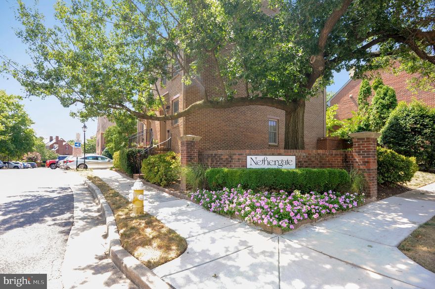 This gracious federal style town home is conveniently located in the Nethergate community in Old Town.  The main level foyer, living room and office area have hardwood floors.  Main level powder room. Living room and eat in kitchen both feature wood burning fireplaces. The next level dining room and kitchen also have hardwood floors. Finished lower level recreation room with built in cabinetry and full bathroom.  The bedroom level offers two additional bathrooms. Wonderful storage space in the attic and throughout the home. Enjoy outdoor entertaining on the large tree shaded brick patio with shed. Walk to restaurants and public transportation and your D.C. commute is a short 4.5 mile drive.