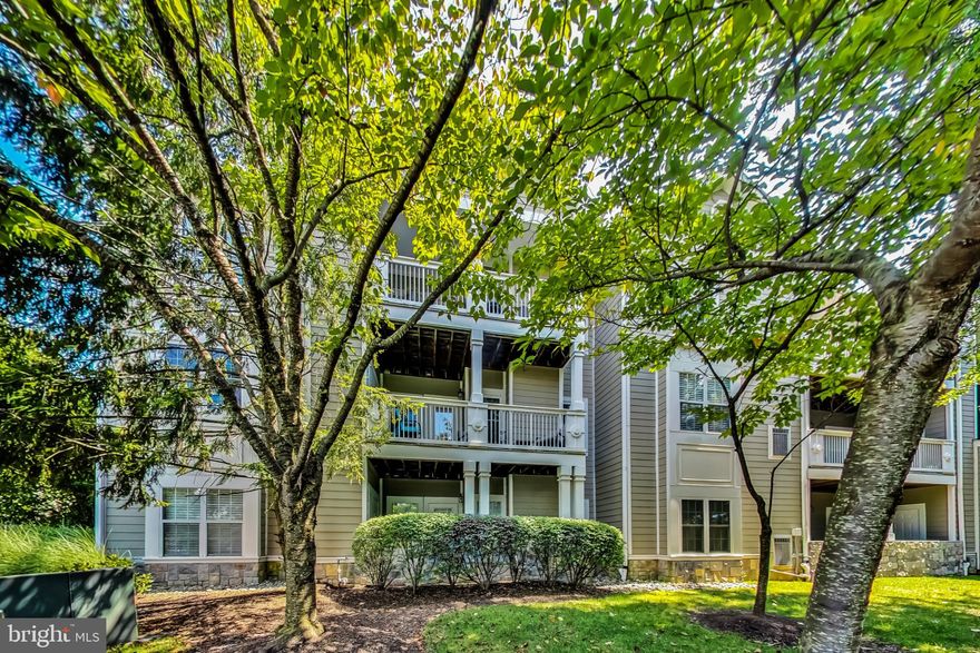 Welcome home to this beautifully updated condo that feels like worlds away from it all but is nestled right in the heart of Reston.  Upon entering this second floor home you will be greeted by a gracious foyer leading to a bright open floor plan with 9' ceilings throughout, large windows with views of trees and a cozy gas fireplace in the family room.   The  spacious  kitchen features ample granite counter space, stainless steel appliances and a pass through to the family room that is perfect for entertaining.  Just off the separate dining room, step outside onto the large, 100 SF covered balcony surrounded by trees and let the day melt away.  CLICK VIDEO ICON TO SEE 3D TOUR

 The oversized primary bedroom  suite is complete with a huge walk in closet with custom built ins and a newly updated, elegant bath.  The second bedroom is large enough to accommodate  both an office and a guest room and has a large closet with custom built ins.  The secondary spa like bath has also recently been updated.  

A large storage closet right next to the front door is also included.  

Recent updates include : Luxury Vinyl Flooring in Kitchen(2023), Carpet (2023,) Hot Water Heater (2023), Both Bathrooms Updated (2023), Garbage Disposal (2022). All Pipes Replaced (2022).  

The Edgewater community offers a large outdoor pool, a well-equipped gym, and a community center.  If you love the outdoors you will appreciate the numerous trails throughout the community and Reston's fantastic trail system, including the  W&OD Trail.  Conveniently located within  walking distance to grocery stores, shops and restaurants of Reston Town Center. Minutes away from the Dulles Toll Road, Fairfax County Parkway,  Silver Line Metro and Dulles International Airport.