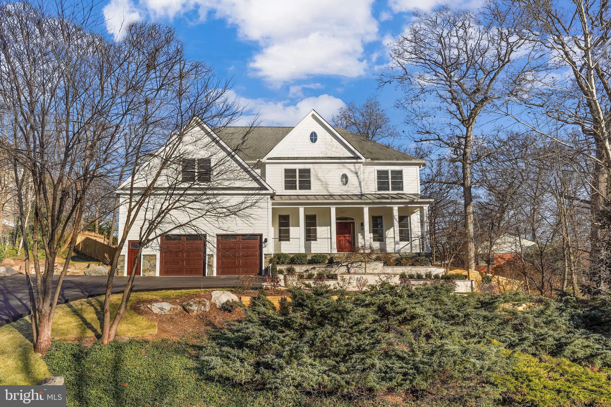 Spectacular in all ways this Custom Transitional Colonial in the highly sought after Salona Village neighborhood has been exquisitely updated with new hardwood floors, new Kitchen, 500+ bottle wine cellar, updated bathrooms, stunning light fixtures, new driveway and garage doors and much more! The new driveway leads you to the lusciously landscaped garden into the charming front porch ready for a morning coffee or a relaxing evening. Enter into an inviting Foyer with arched doorways opening to an oversized Living Room and bright Dining Room, The Family Room features airy window treatments and a gas fireplace. New Kitchen is complete with new center island, granite countertops with under cabinet lighting and all new top of the line appliances and walk-in pantry. The Breakfast Room is surrounded by windows that overlooks the private backyard and provides access to the Patio. Also on the Main Level there is an Office, Full Bath, Mud Room and Powder Room. Upstairs, the Owner’s Suite features tray ceilings, double custom fitted walk-in Closets and and sumptuous Bath with separate vanities, soaking tub and shower. In addition, you’ll find three en-suite bedrooms and a laundry room on the Second Level. The finished walk-out Lower Level continues the amenities with a huge Recreation Room, 5th Bedroom, Full Bath, Wet Bar and new Wine Cellar. Professionally designed Backyard by Charles Owens has a stone walled Patio and gas Fire Pit, vegetable garden and is fully fenced for privacy. This property is within close proximity to Tyson Corner, I-66, I495, George Washington Parkway, Silver Line Metro and walking distance to shops and restaurants in Downtown McLean, For the lifestyle you’ve dreamed about, this home is for you.