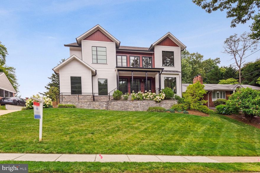 FANTASTIC OPPORTUNITY!  4 YEAR OLD MODERN CONTEMPORARY STYLE HOME THAT FEELS BRAND NEW ON AN AMAZING, HARD TO FIND .33 ACRE LOT ON A QUIET STREET JUST ACROSS THE BRIDGE FROM WASHINGTON, D.C., RIGHT ON THE BIKE TRAIL ALONG THE POTOMAC RIVER, IN ONE OF ARLINGTON'S TOP SOUGHT AFTER SCHOOL PYRAMIDS PLUS AN ELEVATOR! Fantastic curb appeal with Hardiplank siding and Pella casement and picture windows * Side-entry two car garage with Tesla charger, high ceilings, and built-in storage shelving * Flagstone front walk to flagstone front porch with recessed lighting * Open, light-filled modern floor plan with 10' ceilings on the main level, 9' ceilings on the upper and lower levels and 7.5" wide plank oak engineered hardwood floors throughout the main level and upper level * Open Family Room with a cozy gas fireplace, recessed lights, built-in speakers, and sliding door to back yard * Gourmet Kitchen is open to the family room featuring a 48" Bertazzoni stainless steel range with Wolf range hood, 48" Sub-Zero paneled refrigerator and freezer, two paneled Bosch dishwasher, Quartz counters, large breakfast bar with seating, private breakfast nook, two walk-in pantries, plus butler pantry * Mud room off kitchen with built-in storage cubbies, coat closet, and access to the garage and side entry * Formal dining room with floor to ceiling windows, recessed lighting, tray ceiling, and custom chandelier * Formal living room  * Elevator servicing all levels * Primary bedroom with modern tray ceiling, cozy gas fireplace, bar with beverage refrigerator with quartz top and storage cabinets, huge walk-in closet with custom organizers, and luxurious bath with two vanities, ceramic tile flooring, soaking tub with ceramic tile wall, private water closet with glass doors, and shower with glass doors, marble tile floor and surround, built-in bench, and multiple shower heads * Convenient upper level laundry * Three additional upper level bedrooms with walk-in closets and private baths * Lower level family room with full sized windows, wet bar, recessed lighting, and plush carpeting * Multi-purpose room is set up as a fitness studio with rubber floor and mirrored walls and has wiring for a projector as well as surround sound for possible media room * Lower level guest bedroom with full bath * Additional lower level finished room is a perfect play room or home office * Media closet with Sonos Amps, security monitor connected to outside cameras, and internet hub * Generac 22kW back up gas generator * Relaxing , private, fenced,  flat back yard has a flagstone patio with stone wall, rough-in gas line for grill, storage shed, treated cedar fence, and tons of play space * Quiet street with no cut through traffic that makes a loop with Randolph Street * Access to bike trail down to the Potomac River off Randolph Street * Sought after school pyramid of Jamestown, Williamsburg, and Yorktown * Just one stop light to Washington, D.C., easy access to Glebe Road, Chain Bridge, GW Parkway, Downtown D.C., Arlington metro lines, and McLean