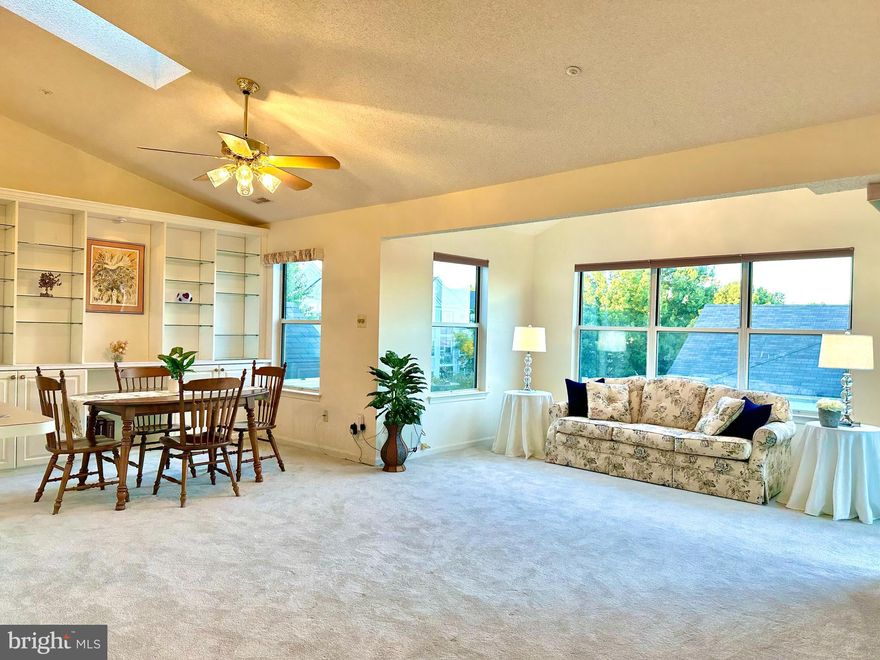 BEAUTIFUL TOP FLOOR CONDO!!!, Two bedroom, two full baths.  Full of natural light, two skylights, cathedral ceiling, GAS FIREPLACE.  Stainless steel appliances, newer full size washer and dryer, newer HVAC and water heater.  New carpet in living room, dining room and hallway. Open balcony, tree views. Two community pools, tennis courts, tot lot. Close to shopping, easy access to ICC, Glenmont Metro and Bus routes.