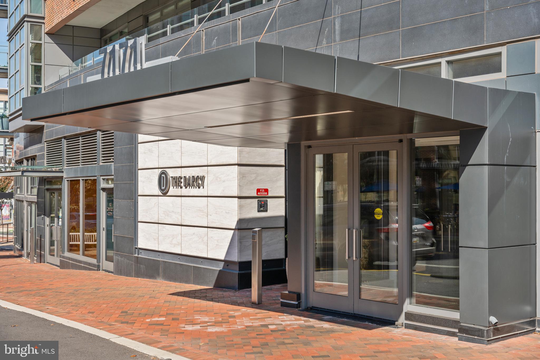 Updated!
Fantastic value and amazing location- the building is in the heart of Bethesda and this unit is just across the hall from an open floor plan community space living room/balcony, kitchen and work space- all of which is perfect for entertaining!
UNIT 206: Spacious primary bedroom with ensuite bath (separate tub and shower and dual sinks), a VERY generous walk in closet (by California Closets).
The second bedroom works well as a den/office as well, with 2 closets and a second full bathroom adjacent.
Laundry in unit. Bosch appliances.
Please see floor plans.
THE BUILDING:
You'll love the beautiful full-service Darcy building in the heart of downtown Bethesda. Friendly front desk attendants and gracious amenities throughout.
Unit 206 has the following special features:
California Closets (primary closet is a generous walk-in)
Stacked laundry in the unit
Bosch stainless appliances
Wide plank engineered wood floors
Grohe faucets + instant hot water in the kitchen
Assigned garage parking spot (1 assigned space is included in price & other spots avail for rent)
Plenty of additional underground covered paid parking for your guests
Assigned storage unit included G2-531 #5
Unit 206 has an open floor plan and is conveniently located outside the common area living room (with balcony), workroom, and full kitchen - so convenient!
About The Darcy:
The complex includes 24 hour concierge, a spacious gym/fitness room, a business center, club room, 2 guest suites (about $200/night) on the 4th floor, and access across the street to a shared rooftop deck with a gas grill, fire pit, lounge, and bar seating. Other perks can be added including a laundry delivery service, housekeeping, deliveries for a separate pay as you go fee.
Note- pets are allowed and welcomed.
Seller improvements:
Grasscloth wallpaper, sconces & mirrors in the entryway + custom wool rugs/mirror can convey
Carpet in the bedrooms replaced with wide engineered wood floors
Additional recessed ceiling lighting and fixtures
Freshly painted including kitchen cabinets and island + 2 brand-new toilets (6/2025)
Unit is VACANT and ready for the new owner(s) - Thank you for reaching out with any questions and to make an easy showing appt.