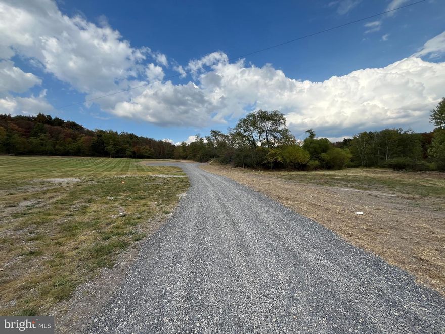 Flat bulidable lot just outside of city limits. Larger property was recently surveyed and divided into multiple lots.