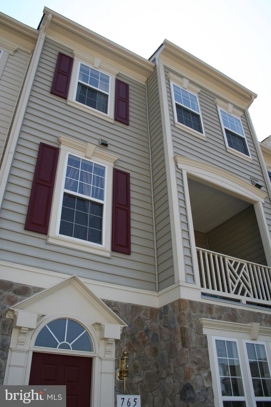 This very comfortable townhome is located in one of Prince William Counties most desireable communities, Belmont Bay on the Occoquan River. VRE train station and commuter lots + I95 only minutes from the door. Beautiful cherry hardwoods and an open kitchen w/island , plus an enclosed balcony for relaxing. Very attractive Master  with hardwoods and designer tile. ALL APPLICANTS MUST APPLY ON LINE. Please follow directions on website and there is a non-refundable $50.00 application fee for anyone over 18. We do require a 640+ credit score. Owner prefers a longer term lease. Tenant agrees to enroll in the Resident Benefit Package provided by KAPM that will provide furnace filters every 90 days, assistance with utility set-up, renters insurance and other services (Cost is $44.95/month with renters insurance and $34.00/month without renters insurance). 2 Garage Parking spaces. Tenant Occupied. Photos from an old Listing.