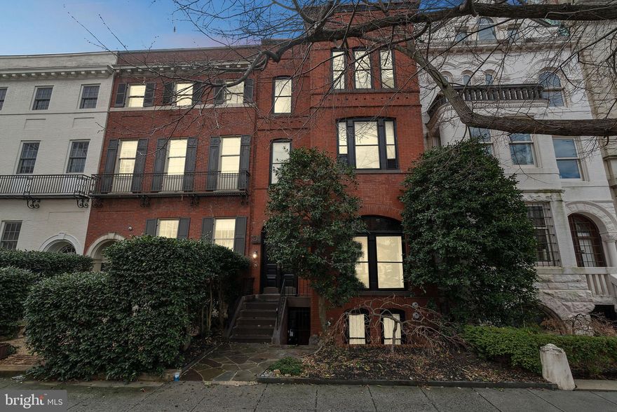 THREE UNIT BUILDING! 8.51% CAP RATE! A rare opportunity for a buyer of any kind: owner occupant, investor, and/or developer! Buy this and live in the master unit, then collect rent from TWO additional units, even as AirBnB (est. $6-8k/month), or develop into 5, 6, 7 units in this prime Dupont location! Zoned RA-8 for maximum opportunity (50' height and 1.8 FAR)! Master is a two-level unit with bay windows in living room AND master bedroom, plus a wonderful terrace off the dining room shaded by a 60' magnolia tree. Kitchen is updated and open with lots of counter space. Below are TWO marvelous units featuring lovely original details (fireplace mantels, crown moulding, lighting and more) with great cash flow. And to top it all off, a lovely brick patio surrounds the home and leads to TWO-CAR PARKING, easily accessible from Corcoran Street. Sold TOPA-Free and fully vacant May 1, 2019!
