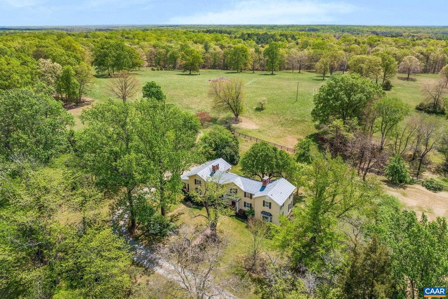 On the market for the first time in nearly 50 years, this remarkable 130-acre property offers a rare opportunity to own a diverse and scenic piece of Central Virginia. Spanning 2 distinct parcels, the land features rolling pastures, hardwood forests, two ponds, & breathtaking views of Southwest Mountain?all anchored by a  picturesque c. 1900 farmhouse. Perfectly suited for horses, cattle, hay, or even a vineyard, the property is an excellent candidate for conservation easement. Surrounded by protected farms and estates, it offers both privacy &  long-term preservation potential. The character-rich farmhouse could serve as a primary residence, weekend retreat, or guesthouse?leaving open the option to build on one of several exceptional homesites with mountain views. Additional improvements include a 2nd home overlooking a pond, a small barn, an equipment shed, & gently rolling acreage ready for agricultural or recreational use. Located in a region rich with history and natural beauty, this special offering is priced $400,000 below the 2025 assessment?an incredible value for land of this caliber. Just 25 min to Charlottesville, 1 hr to Richmond, 2 hrs to D.C., and only moments to the conveniences of historic Gordonsville.,Fireplace in Dining Room,Fireplace in Great Room