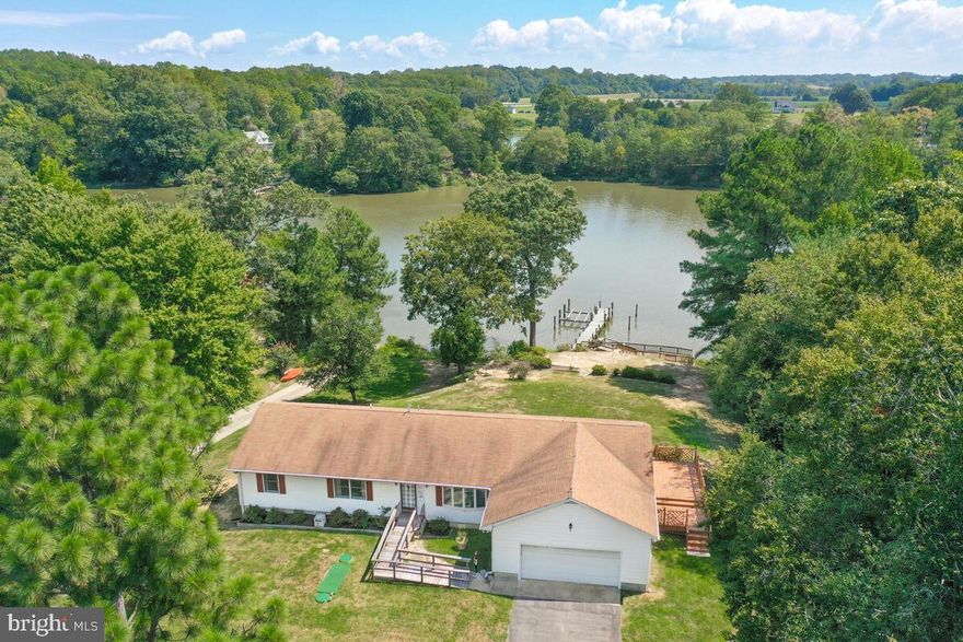 Motivated Sellers! Nestled in the charming community of Broomes Island, this waterfront gem offers the perfect retreat from the hustle and bustle of city life. This rambler-style home boasts 1428 square feet of living space and is sure to captivate you with its tranquil surroundings.


Step inside and be greeted by spacious rooms drenched in natural light. The large bedrooms provide ample space for relaxation, while the abundance of closet space ensures all your storage needs are met. The hall bath features a bathtub, perfect for unwinding after a long day.


The heart of this home lies in the kitchen, where a breakfast bar and huge table space offer plenty of room for entertaining family and friends. Imagine waking up to panoramic views of the water as you enjoy your morning coffee.


But it's the additional features that truly set this property apart. With 130 feet of waterfront, a private pier with a boat lift, you'll have direct access to endless adventures on the water. The deck and sunroom provide the perfect spots to soak up the sun while taking in the breathtaking views.