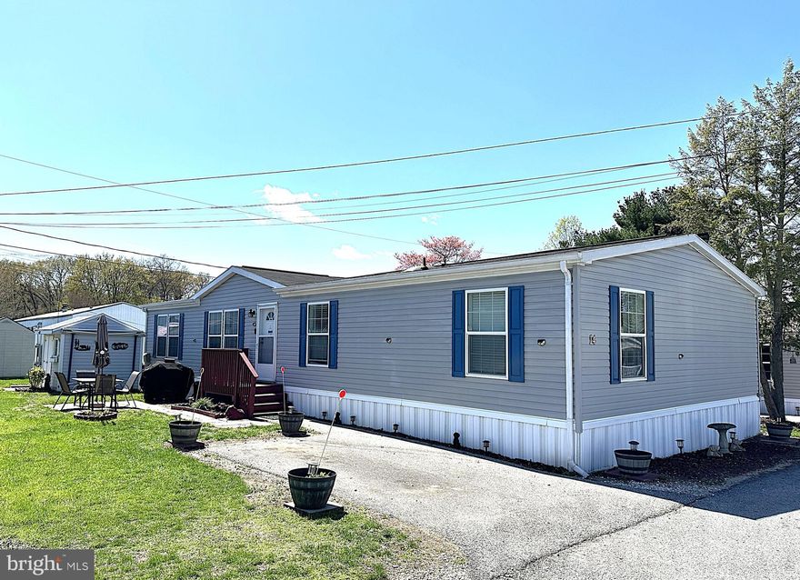 Beautiful and Spacious Double Wide in a Great Odenton Location! Over 1700 Square Feet of Living Space with Many Nice Updates Including Luxury Vinyl Plank Throughout the Main Living Area, Stainless Refrigerator, Dishwasher and Built-in Microwave and New Paint Throughout. Inside this home Features a Large Kitchen with lots of Cabinets and Counter Space Leading Through the Formal Dining Room to a Big Family Room with a Fireplace. You have a Nice Sized Formal Living Room. A Big Primary Bedroom with a Private Bathroom and Walkin Closet. Good Sized 2nd and 3rd Bedrooms. There are Ceiling Fans in Every Room. Outside is a Nicely Landscaped Yard with a Driveway, Patio and Shed. Close to Schools, Parks Shopping and Restaurants. Minutes to Ft Meade and the MARC Train Station. Don't mis out on this one. Contact me today for Private Viewing.