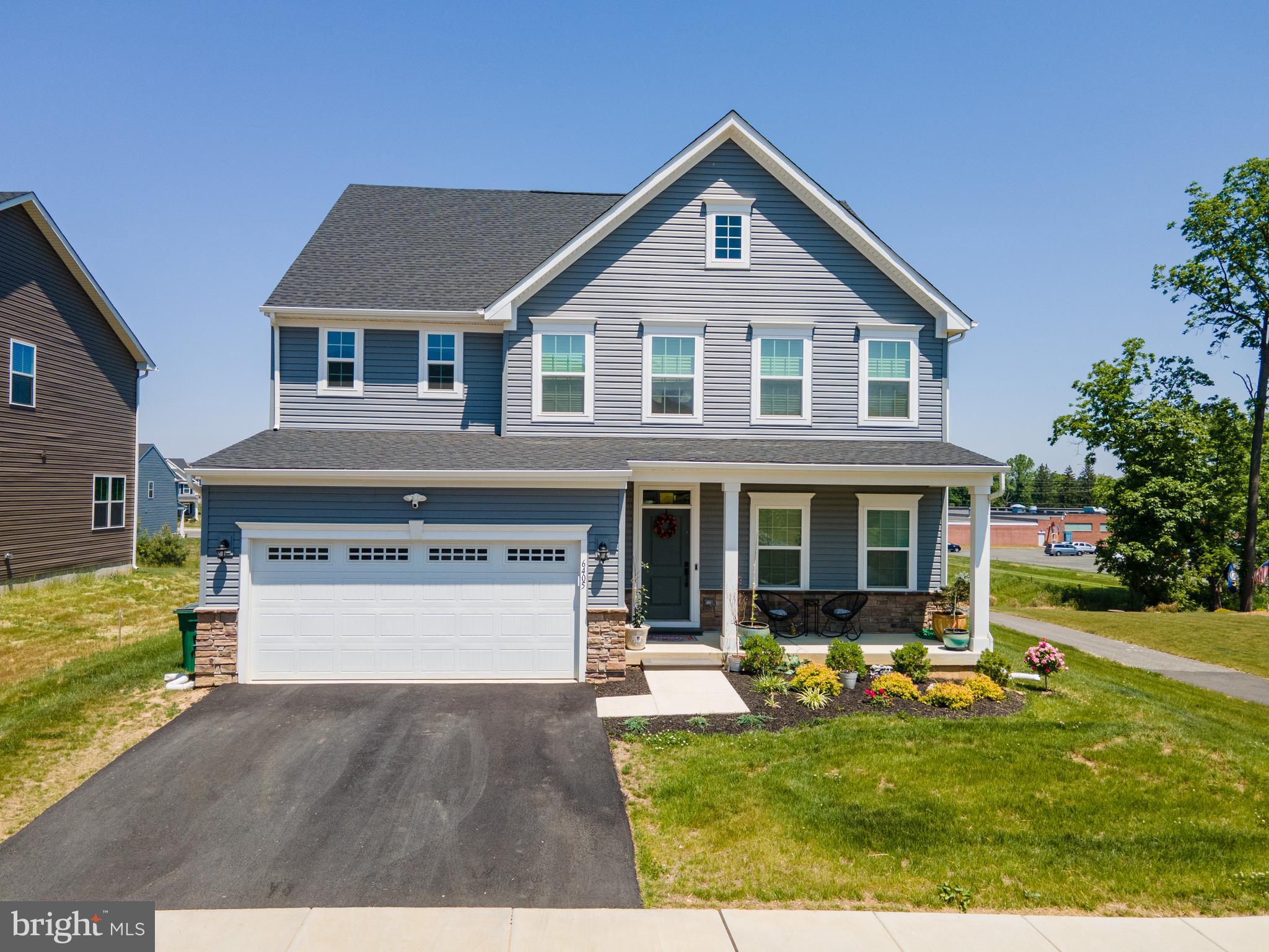 Boasting over $60,000 in premium upgrades, this home offers comfort, style, and functionality in every detail. Welcome to beautifully upgraded 5-bedroom, 3.5-bath detached home nestled in highly desirable East Penn School District. Step inside to find hardwood floors and recessed lighting flowing throughout the main level, creating a warm and inviting atmosphere. The bright family room features a centrally located electric-controlled fireplace, perfect for cozy gatherings. The gourmet kitchen is a chef’s dream, outfitted with granite countertops, stainless steel appliances, a large center island with bar seating, pantry, and a charming breakfast nook for casual dining. Upstairs, the luxurious master suite showcases an upgraded bath complete with custom countertops, extended cabinetry, and a spacious Roman shower. Additional bedrooms offer generous space and flexibility for family, guests, or a home office. The home is equipped with a whole-house humidifier integrated with heating and cooling, and pre-installed hot water lines for bidets in the bathrooms—adding comfort and convenience. Enjoy extra living and entertainment space in the fully finished basement, ideal for a media room, playroom, or gym. A covered front porch, 2-car garage, & paved driveway complete the exterior of this exceptional property. Conveniently located close to major highways I-476 and US-222 for easy commute, Brookside Country Club & much more!