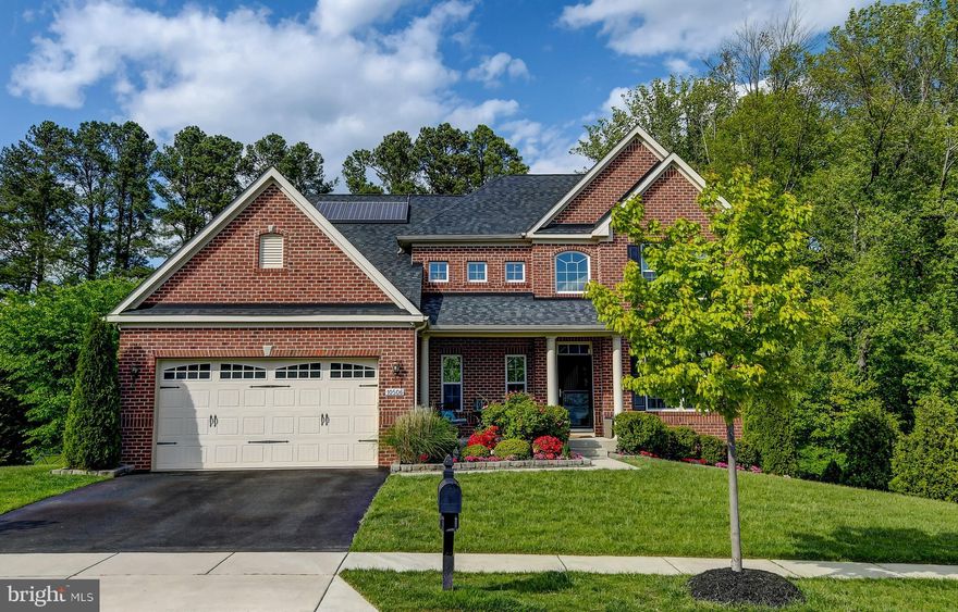 You are HOME! Beautiful colonial situated on premium lot with modern comforts and attention to detail and updates throughout! The two-story foyer welcomes you and proceeds into the formal living and Kitchen highlighted by crown molding, tray ceiling, and chair railing. Let the kitchen inspire gourmet meals boasting 42  cabinetry, backsplash, stainless steel appliances, gas cooktop, double oven, large center island, and granite counters. Updated moulding , outlets and dimmer switches throughout, hardwired security system, HDMI cable in rooms.  Main level office and laundry leading to spacious garage with added additional attic storage space. Walk through the double doors to the Owners Suite you are sure to be impressed with gorgeous updated tile, soaking tub, and double vanity, double walk-in closets and trey ceiling. Relax and enjoy indoor and outdoor entertaining with the Living room that offers a pellet stove fireplace and access to the sizable composite deck and rear yard, with patio area surrounded by trees and wooded area. This is not your average basement! Lower level living that provides a private entrance, fully equipped custom built bar with ice maker, refrigerators and dishwasher open plan with second lower level living room, full bath, and safe room/possible panic room, this one has it all!Major commuter routes include US-40, US-1, and I-95.