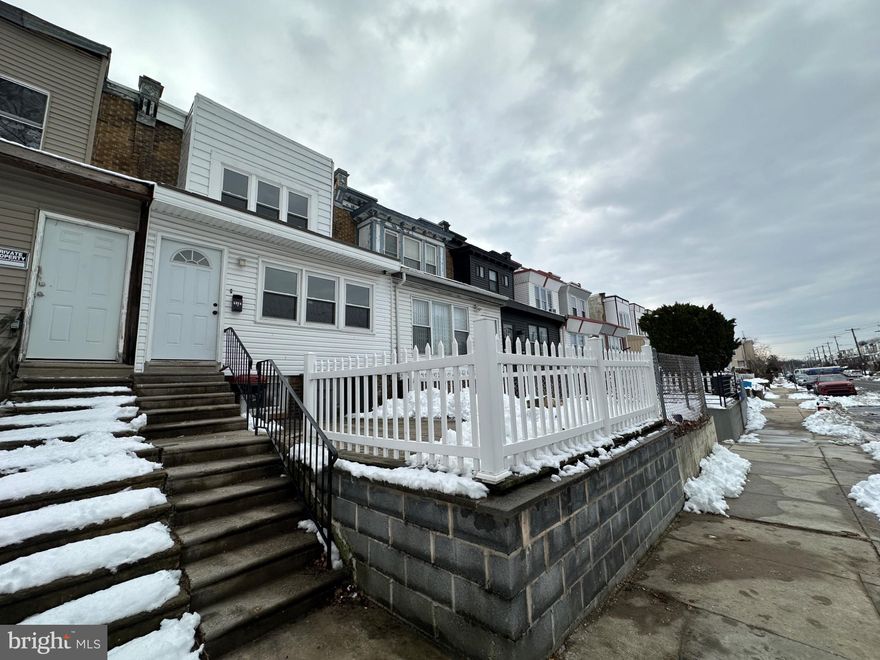 This charming interior row townhouse in the heart of Kingsessing has undergone a major renovation in 2020, blending modern comforts with traditional appeal. With 1,200 square feet of thoughtfully designed living space, this home features three inviting bedrooms and one and a half bathroom, a front wood deck perfect for both relaxation and entertaining. Step inside to discover a fully finished basement that offers endless possibilities-whether you envision a cozy family room, a home office, or a play area. The main living areas are bathed in natural light, creating a warm and welcoming atmosphere. The open layout allows for seamless flow between spaces, making it ideal for gatherings with friends or quiet evenings at home. The updated kitchen is ready for your culinary adventures, while the adjacent dining area invites shared meals and laughter. Outside, enjoy the convenience of easy to find on-street parking and a low-maintenance lot, allowing you to spend more time enjoying your home and less time on upkeep. Located in a vibrant community, this property is just a stone's throw away from local amenities, parks, and public transportation options. This home is not just a place to live; it's a sanctuary where memories are made. Experience the perfect blend of comfort, style, and convenience in this beautifully renovated townhouse. Don't miss the opportunity to make it your own!