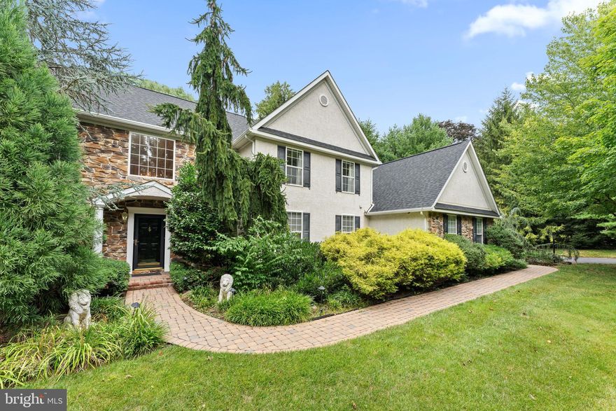 Welcome to 108 Willowburn Rd, a stunning and custom home situated in the charming and highly sought area of the Main Line in Villanova.  Built in 1999 and finished in January 2000, this spacious residence with an easy-living floor plan offers an impressive array of features and stately details that will captivate even the most discerning buyer.
Entering through a grand 2-story Foyer sets the tone for the elegance found throughout the home with the focal point the beautiful chandelier that is on a motor for easy access to change lightbulbs and clean. The stunning Living Room boasts beautiful hardwood flooring, double crown molding, tall baseboards, an inviting gas fireplace, and ample windows that fill the space with natural light. The Living Room seamlessly flows into the formal Dining Room, maintaining the same elegant features, creating the perfect ambiance for hosting sophisticated dinners. The gourmet Kitchen, equipped with white cabinetry and high-end appliances including Sub-Zero, Dacor, Thermador, and Fisher & Paykel, makes preparing meals a breeze. The adjacent Breakfast Room features a glass slider that opens to a stunning, oversized deck, perfect for morning coffee, evening relaxation, or entertaining friends and family.  The welcoming Family Room, located off the Kitchen, provides a perfect space for relaxation and has a large slider with access to the rear Deck. Conveniently, the first floor also includes an Office/Bedroom with an ensuite Bath, ideal for work-from-home needs, guests or multi-generational living.  A Mudroom/Laundry Room, and Powder Room complete the first floor.
Upstairs, the luxurious Primary Bedroom Suite features an ensuite Bathroom with double vanities, a shower stall, a thermal heat lamp, a jacuzzi tub, a private toilet, a walk-in closet, and an additional double-door closet. A second Primary Suite offers another ensuite Bath and walk-in closet. Two additional Bedrooms share a well-appointed hall Bathroom.
The amazing finished lower level boasts a Billiard Room with a full wet bar/ kitchenette perfect for entertaining, and a Movie Room equipped with high-end stereo equipment. A Bonus Room with a Half Bath offers versatile space for additional living or guest accommodations. The lower level also includes a Workout Room and an additional Laundry Room for convenience, as well as unfinished Storage with a walk-up Bilco door and a Utility Room.
Outside, the beautiful, oversized Deck is surrounded by mature landscaping, providing a serene outdoor retreat. The attached 3 1/2-Car Garage offers ample space for vehicles and storage. Special features of this home include whole house speakers in the Living Room, Family Room, Dining Room, Deck, and Primary Bedroom, as well as a whole house water filter, and a zoned heating system for comfort. An exterior sprinkler system for the entire property and flower beds helps keep the gardens and yard lush and inviting. A state-of-the-art security system with cameras covering the front door, driveway, and deck ensures peace of mind.  Additionally, there is  a house generator, so you won't lose power, even if the electricity goes out.
Situated in the prestigious Radnor School District, this home is conveniently located with easy access to all the Main Line has to offer, including top restaurants, shopping, nightlife, Villanova University and access to Philadelphia, major highways, and the regional rail system. Schedule your appointment today and experience the luxury and convenience of 108 Willowburn Road in Villanova!